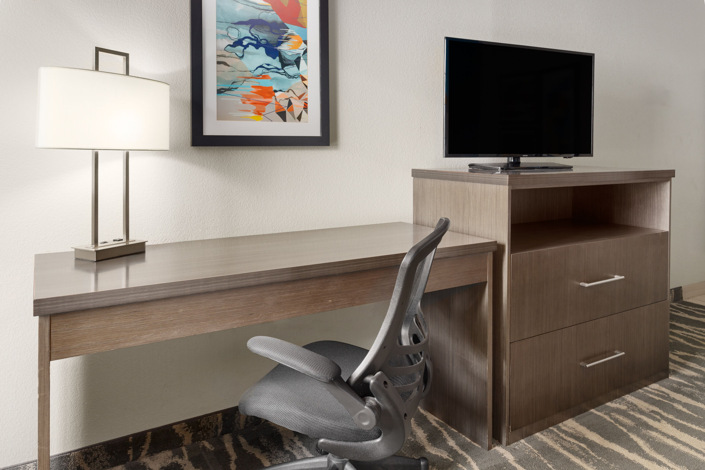 Guest room at the La Quinta Inn & Suites by Wyndham Kokomo in Kokomo, Indiana