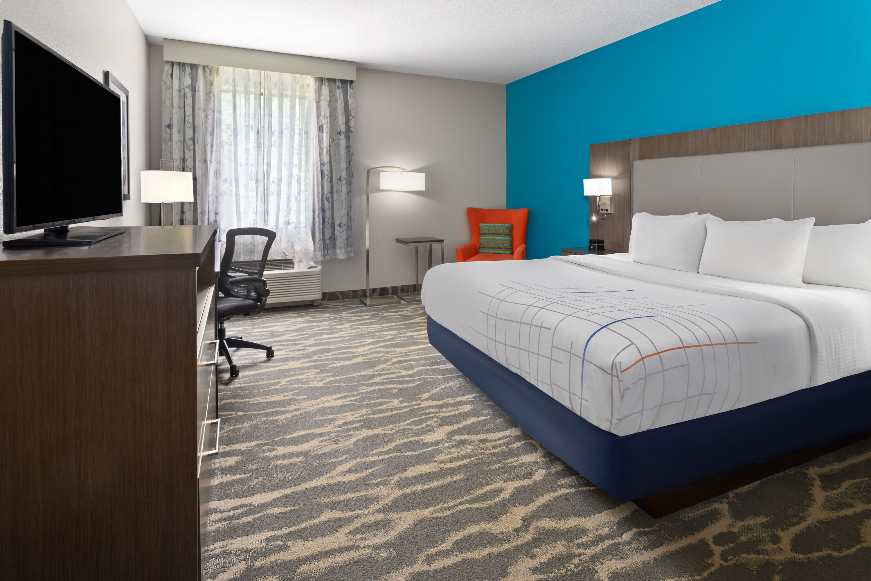 Guest room at the La Quinta Inn & Suites by Wyndham Kokomo in Kokomo, Indiana