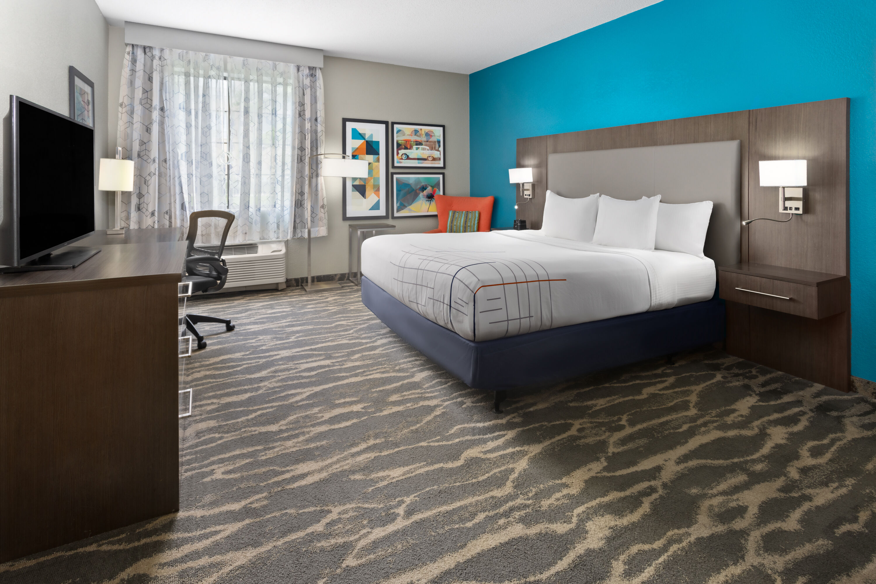 Guest room at the La Quinta Inn & Suites by Wyndham Kokomo in Kokomo, Indiana