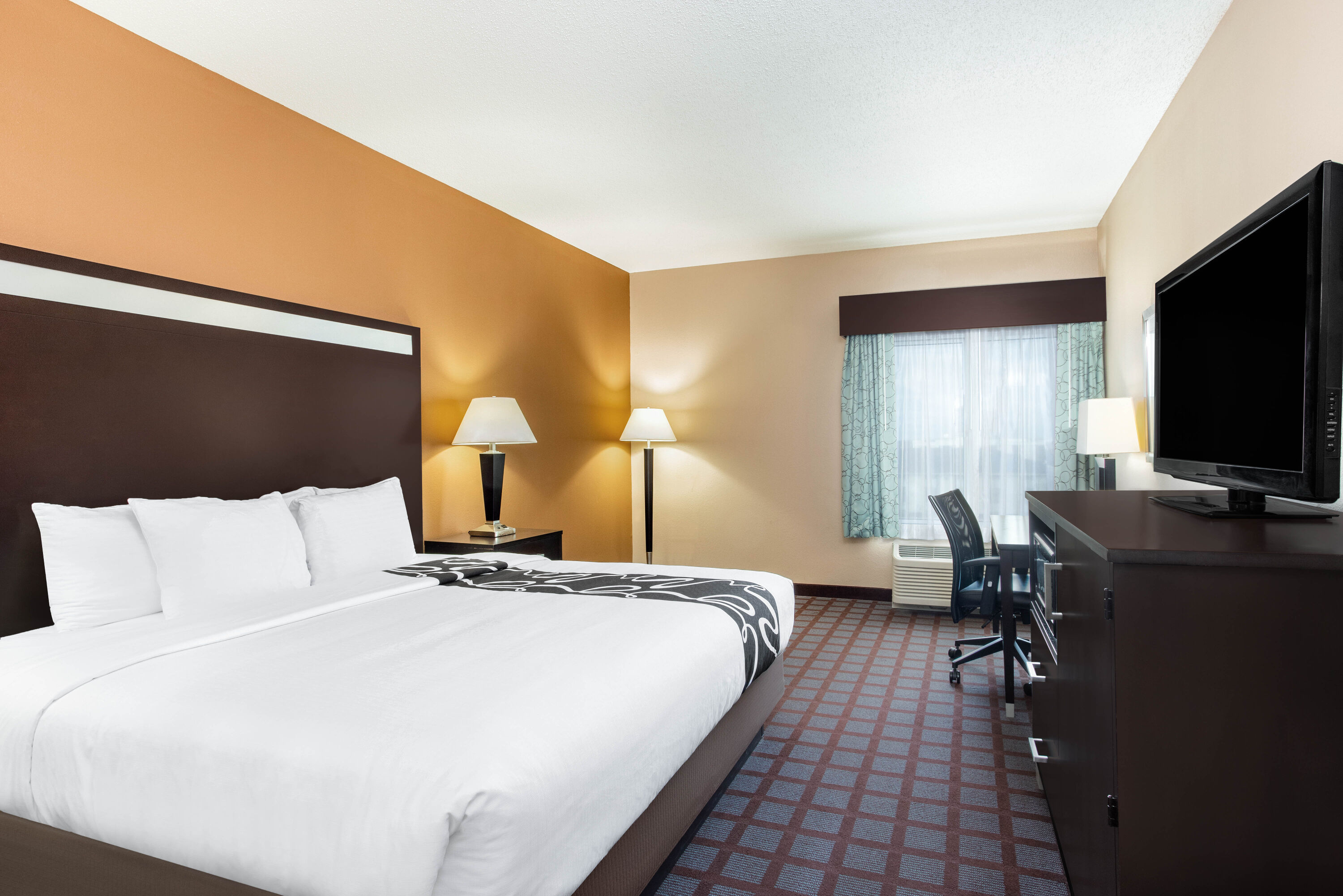 Guest room at the La Quinta by Wyndham Indianapolis Airport Plainfield in Plainfield, Indiana