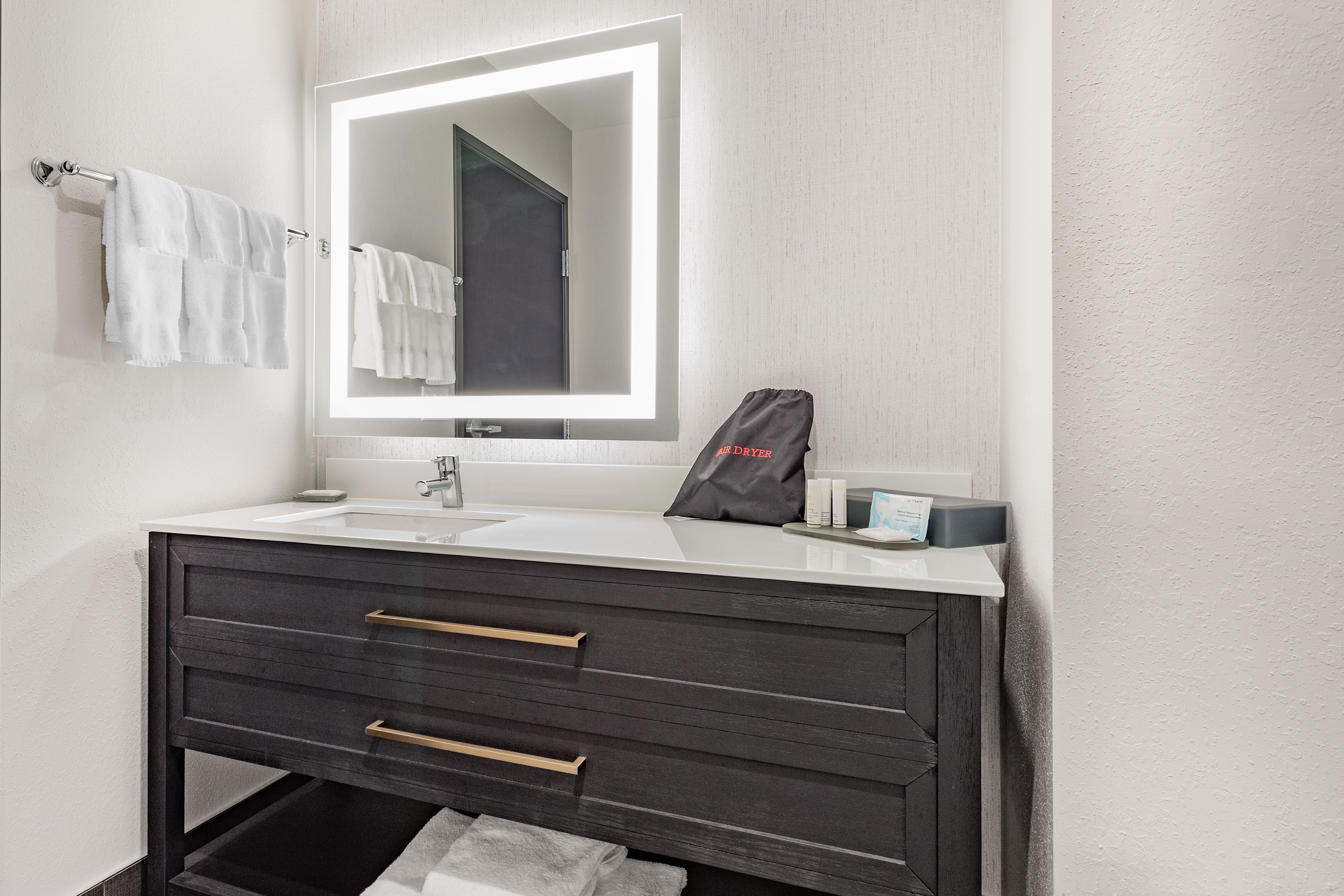 Guest room bath at the LaQuinta Suites by Wyndham South Bend Notre Dame Area in South Bend, Indiana
