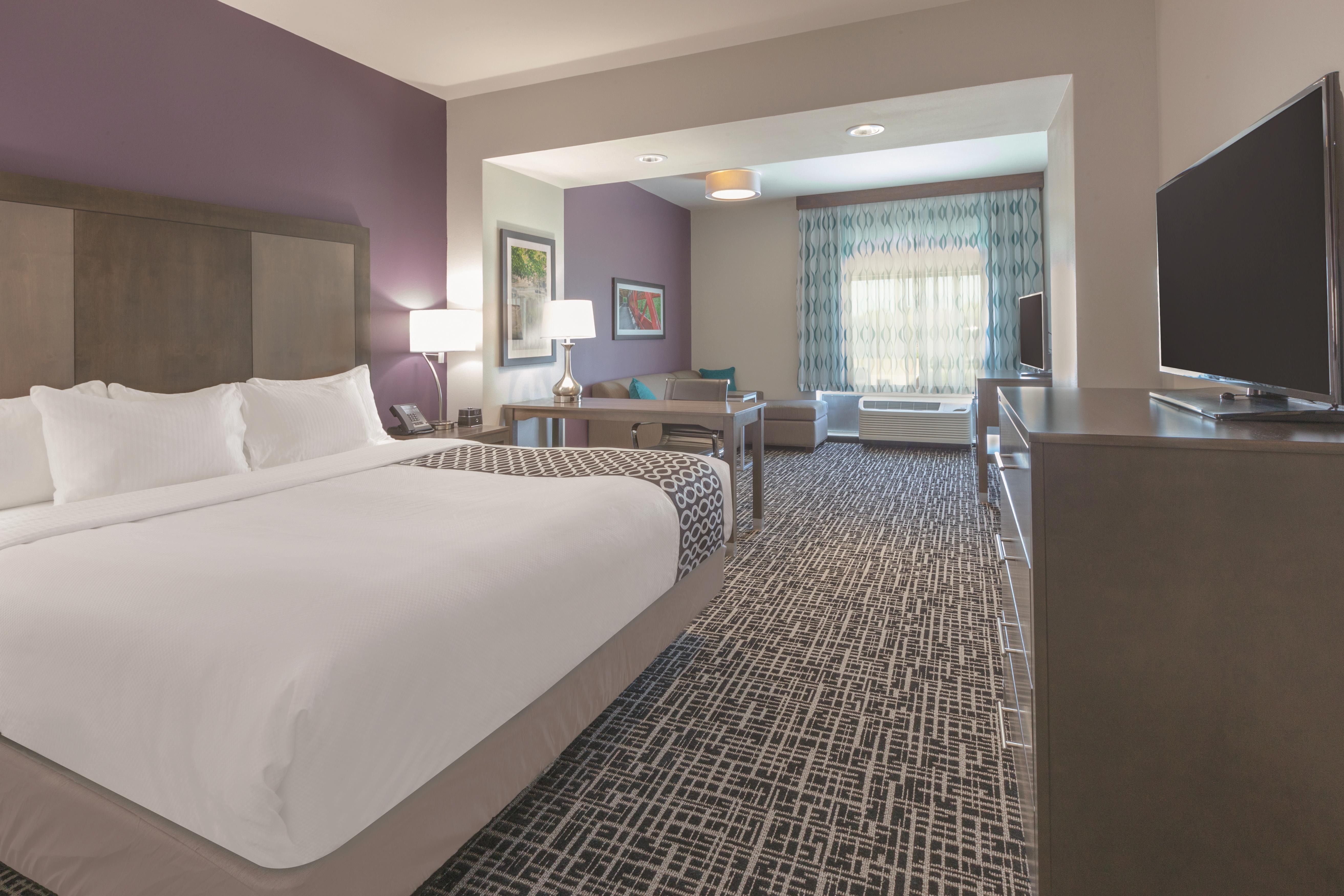 Guest room at the La Quinta Inn & Suites by Wyndham Terre Haute in Terre Haute, Indiana