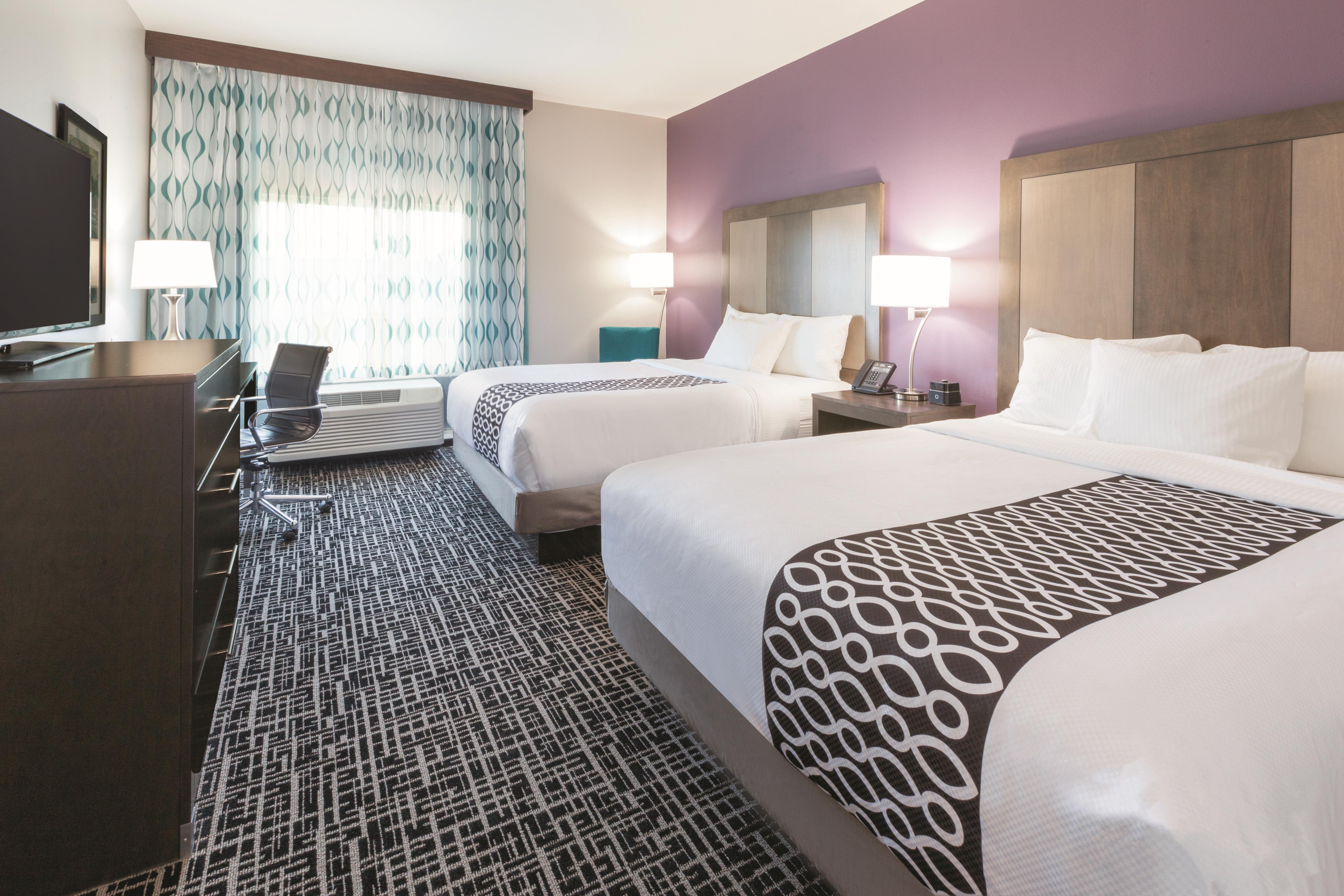 Guest room at the La Quinta Inn & Suites by Wyndham Terre Haute in Terre Haute, Indiana