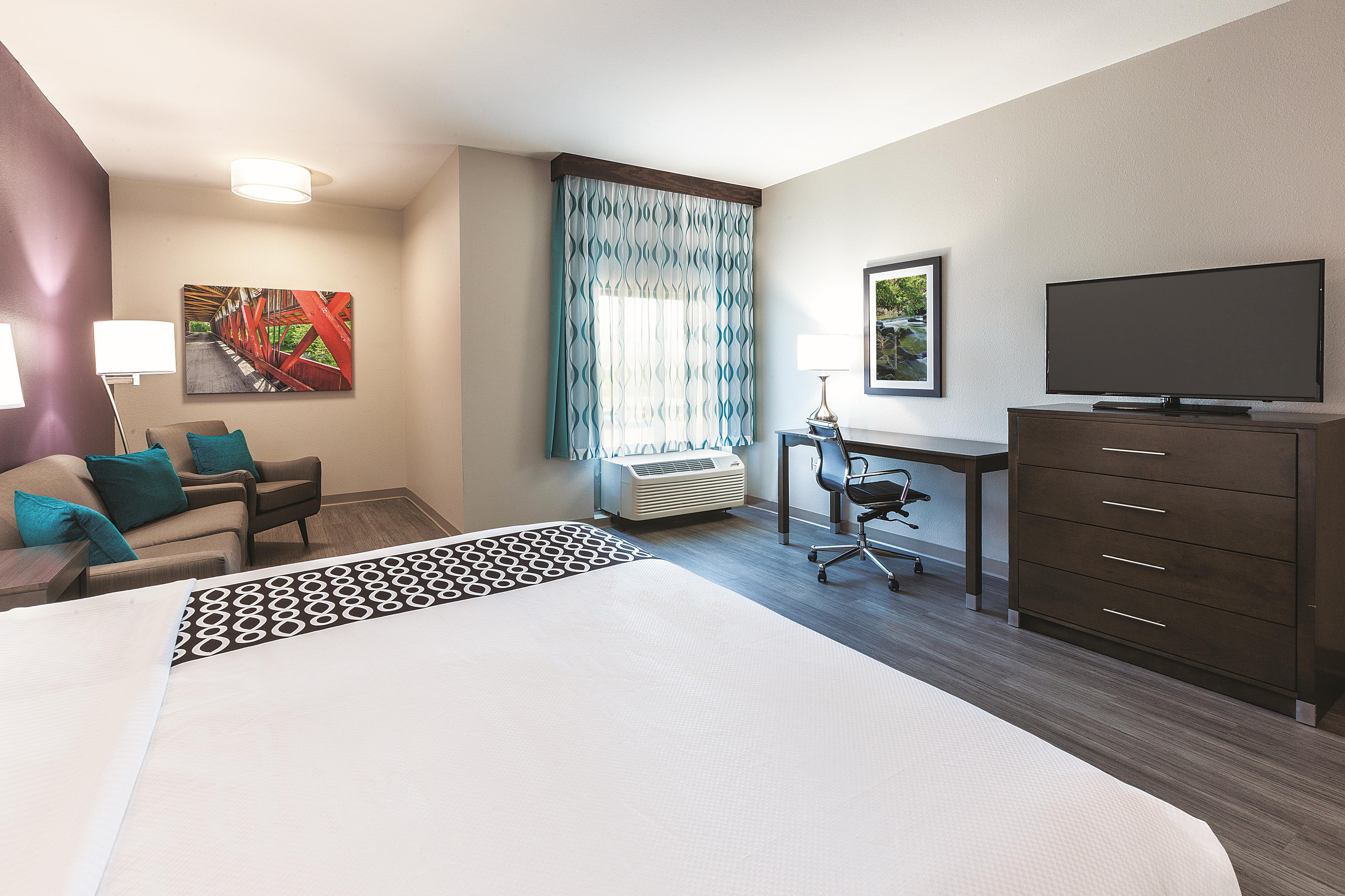 Guest room at the La Quinta Inn & Suites by Wyndham Terre Haute in Terre Haute, Indiana