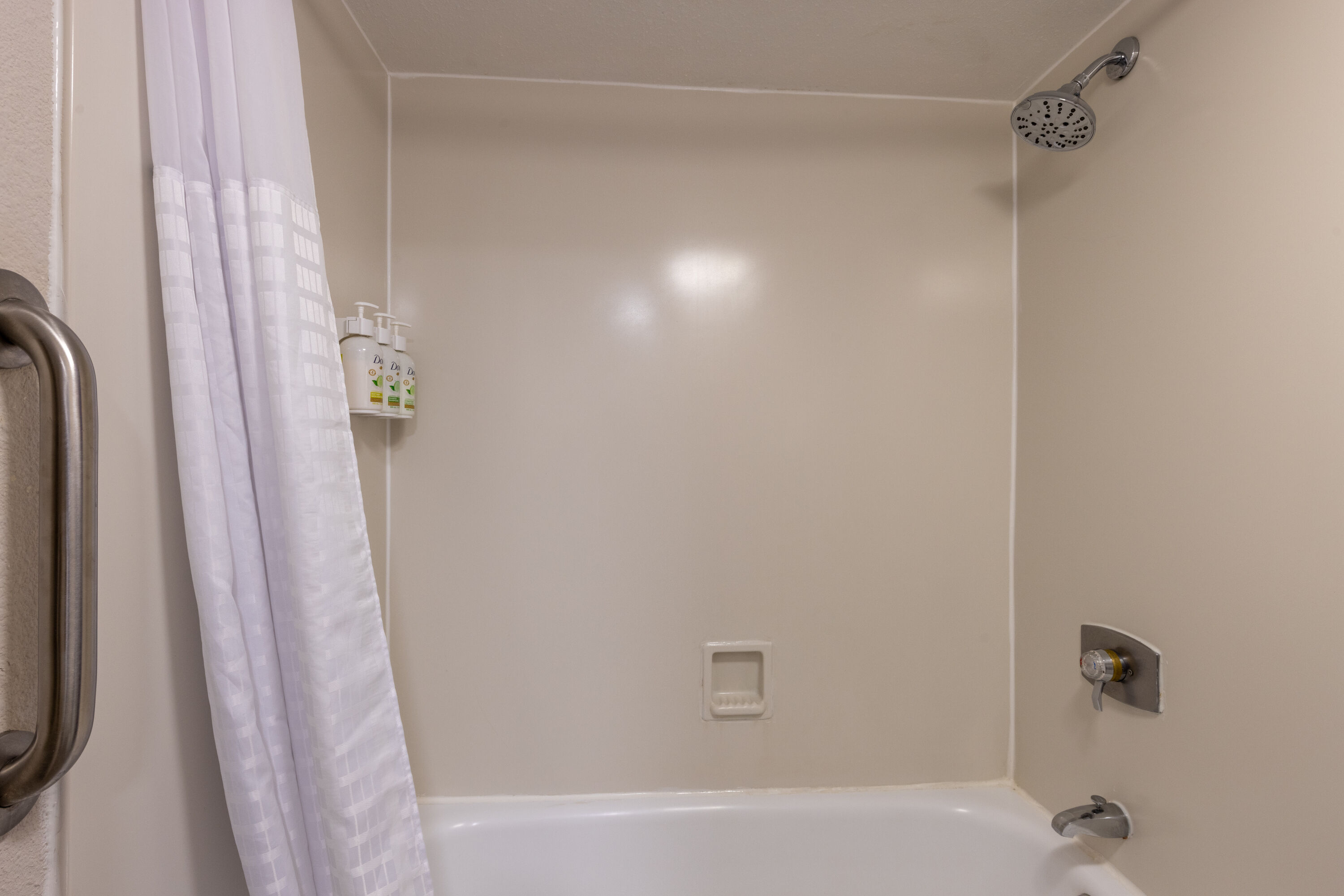Guest room bath at the La Quinta Inn by Wyndham Kansas City Lenexa in Lenexa, Kansas