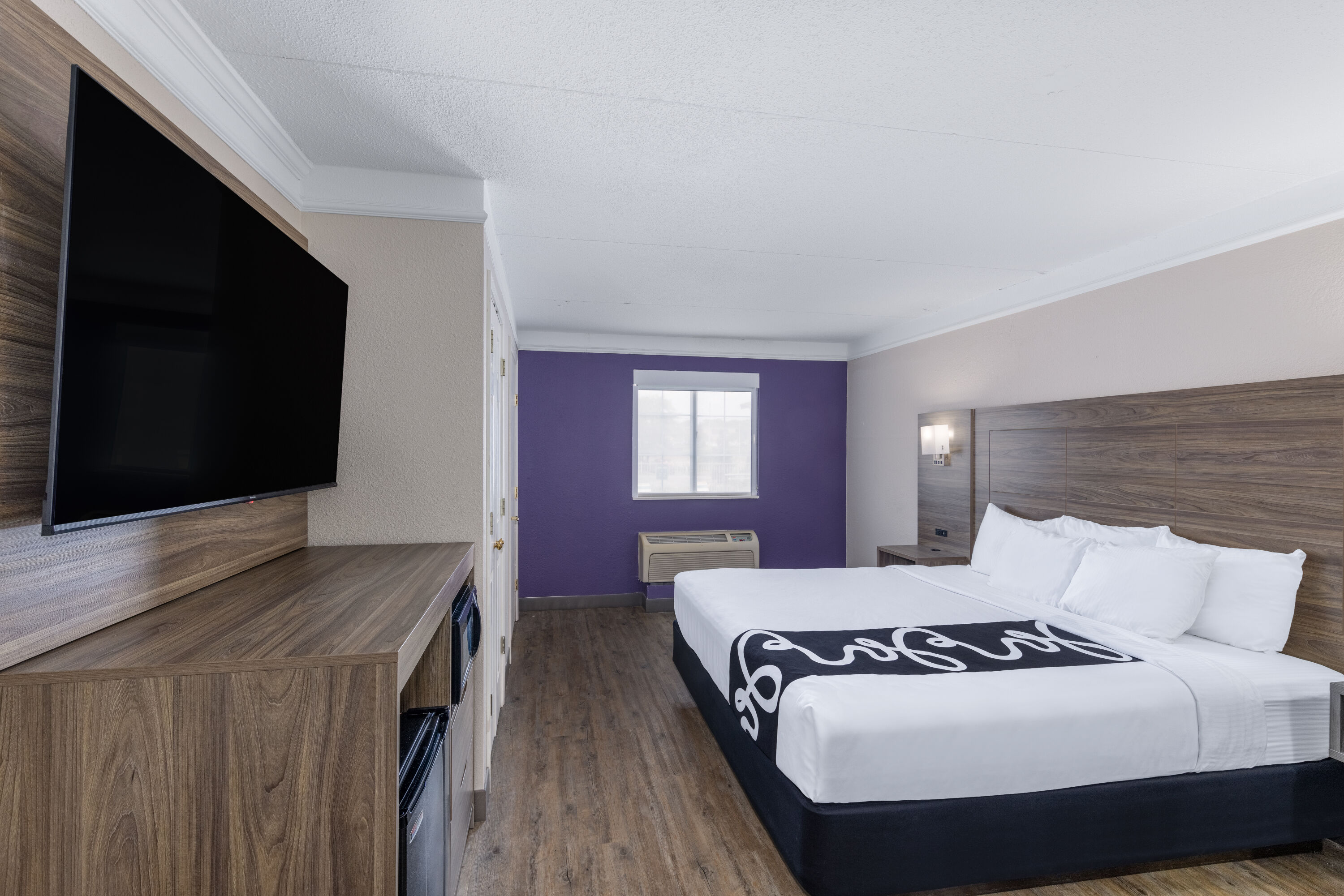 Guest room at the La Quinta Inn by Wyndham Kansas City Lenexa in Lenexa, Kansas