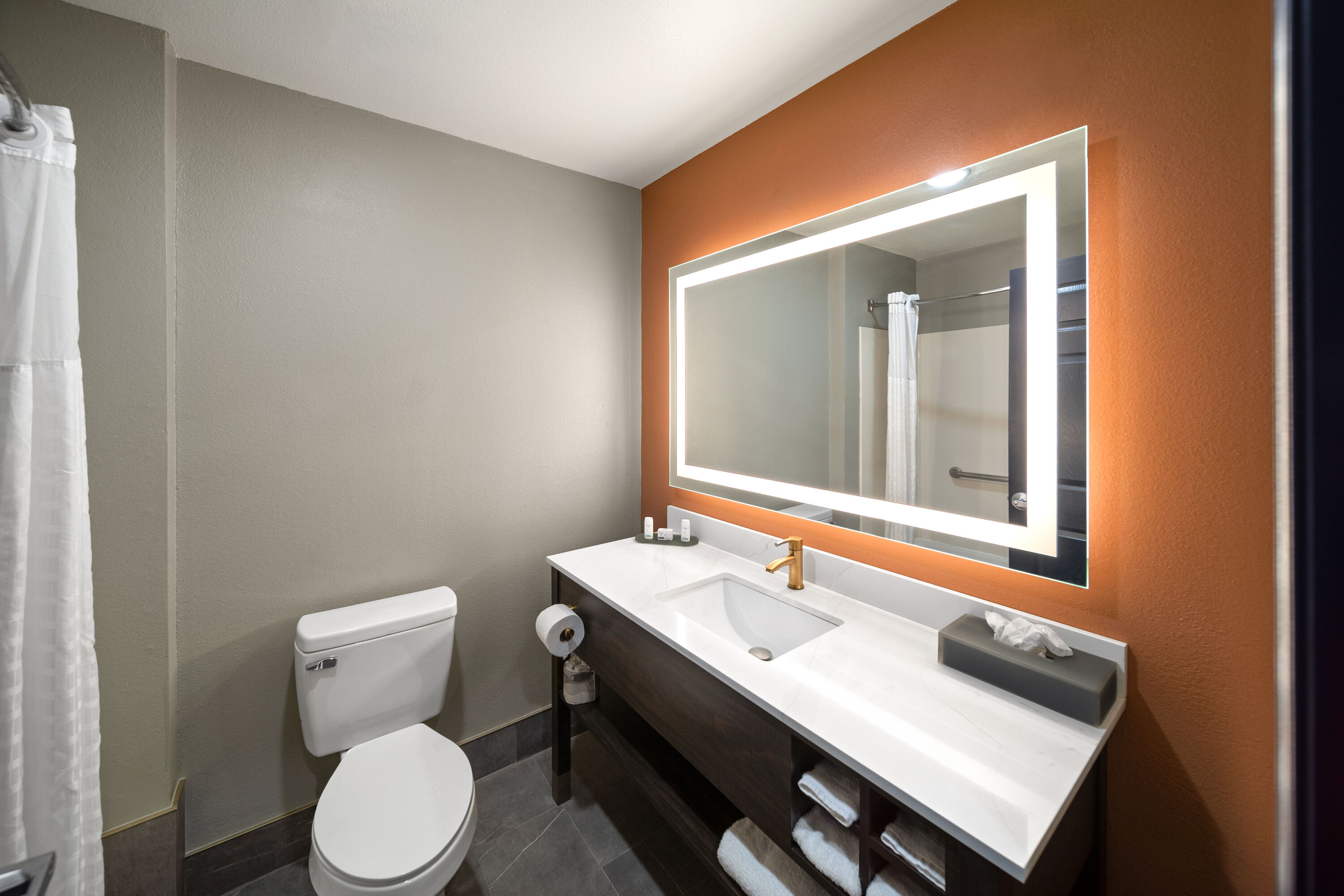 Guest room bath at the La Quinta Inn & Suites by Wyndham Olathe in Olathe, Kansas