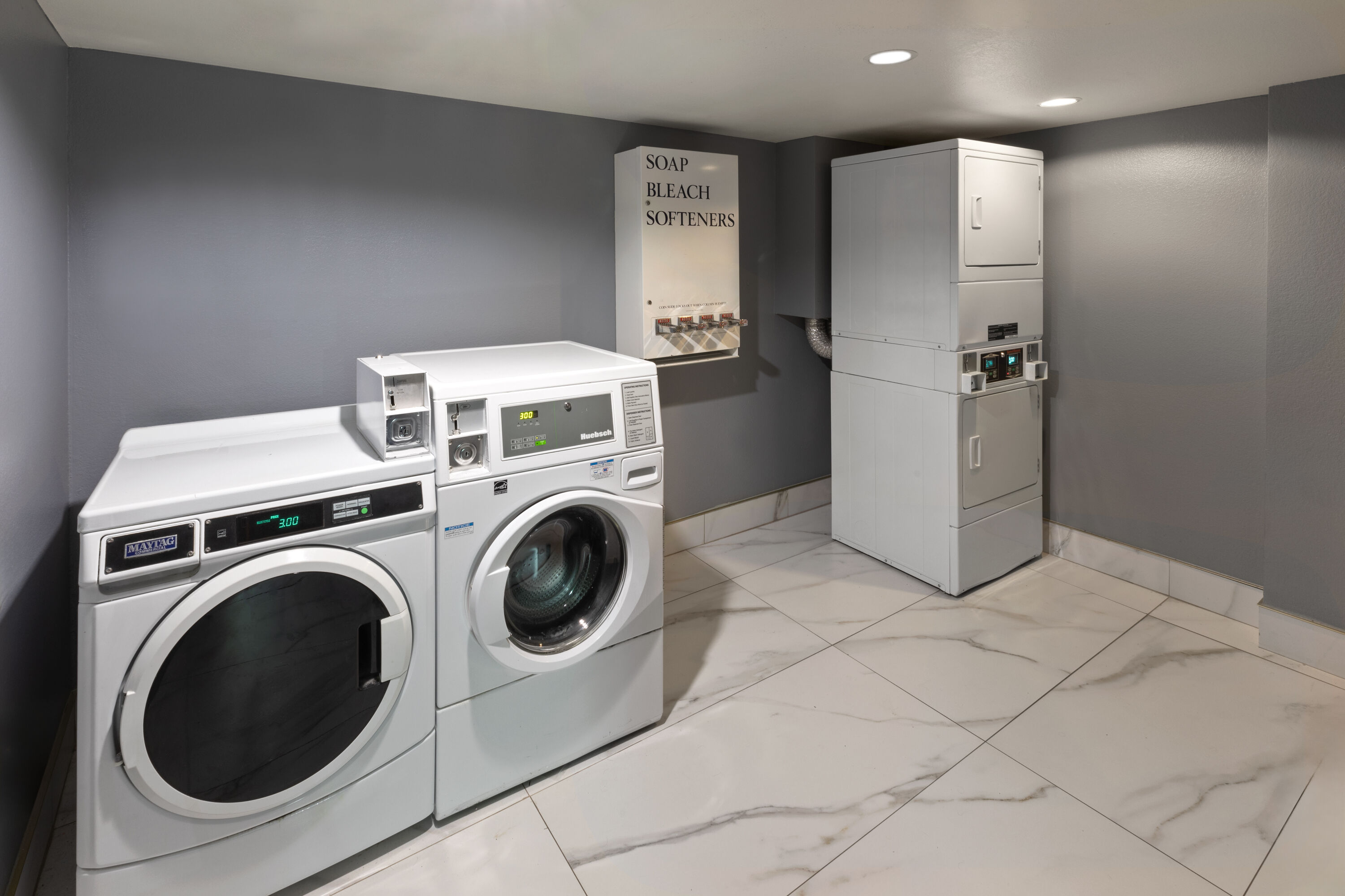 Laundry facilities at La Quinta Inn & Suites by Wyndham Olathe in Olathe, Kansas