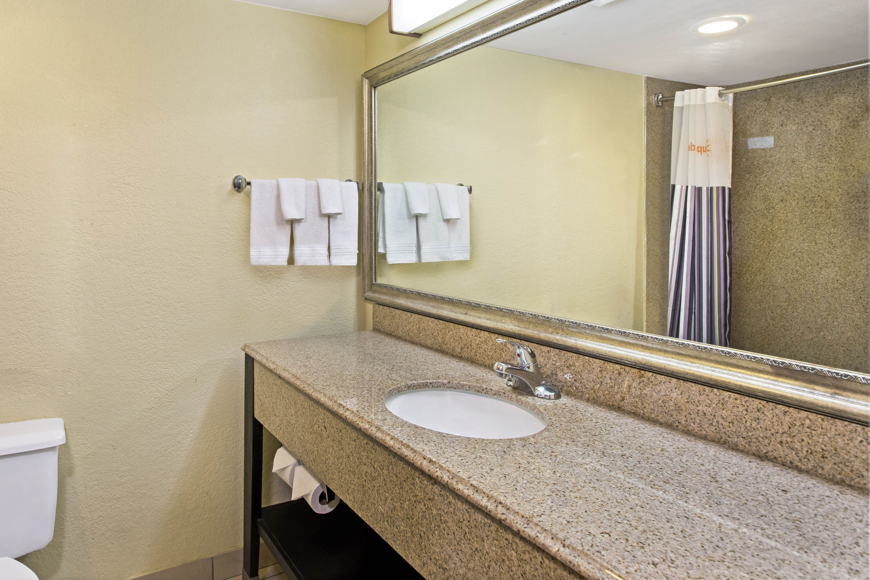 Guest room bath at the La Quinta Inn & Suites by Wyndham Salina in Salina, Kansas