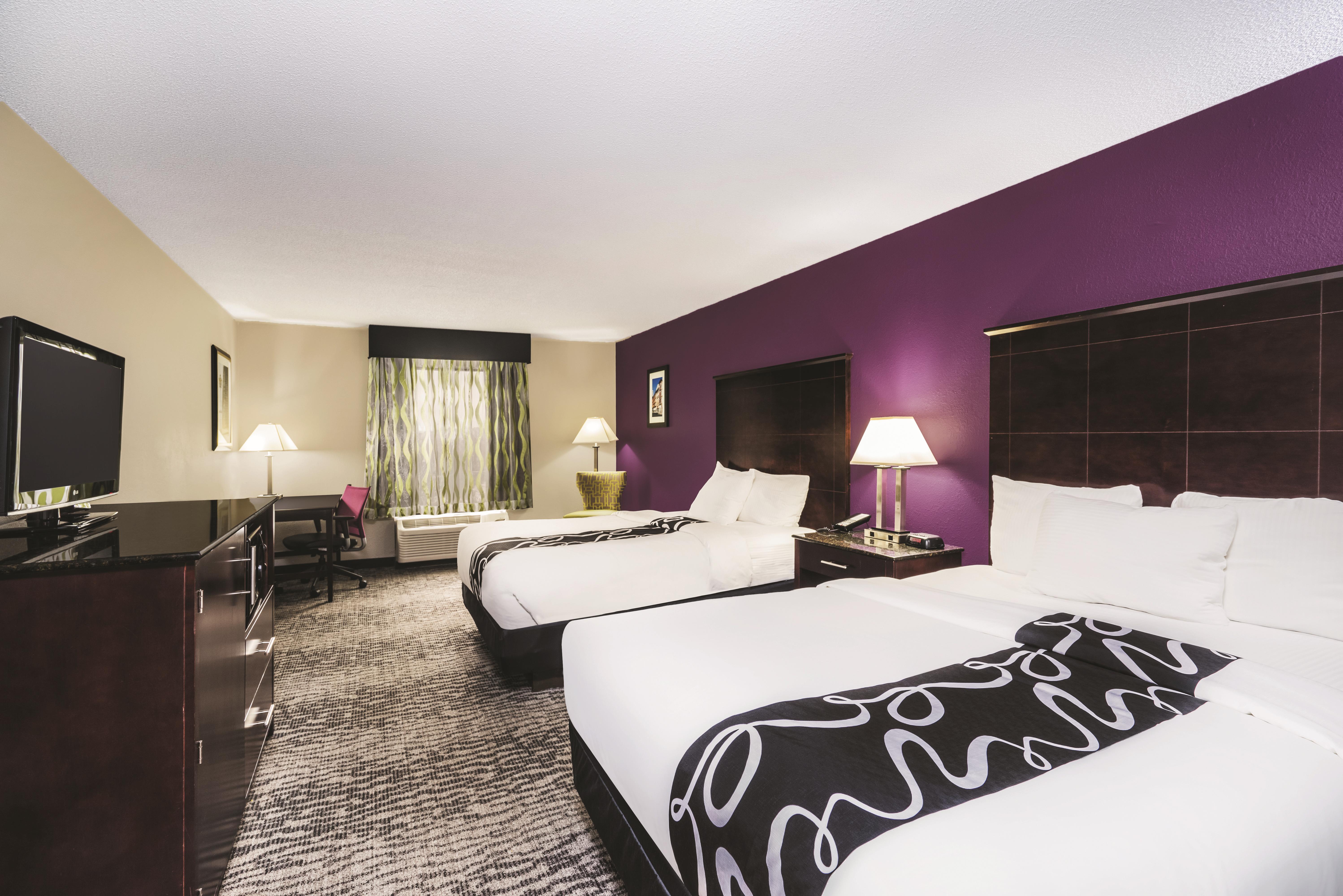 Guest room at the La Quinta Inn & Suites by Wyndham Louisville East in Louisville, Kentucky