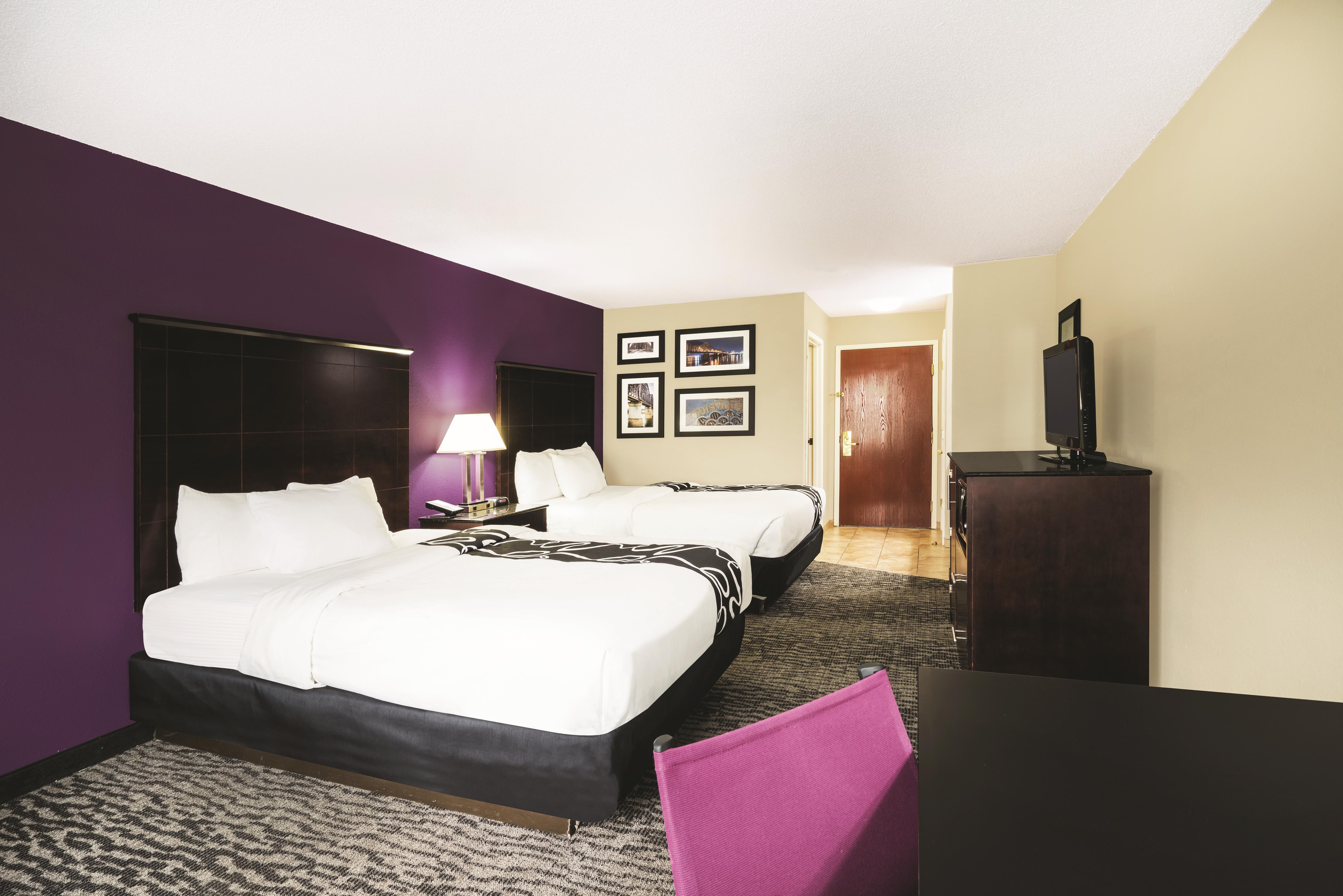 Guest room at the La Quinta Inn & Suites by Wyndham Louisville East in Louisville, Kentucky