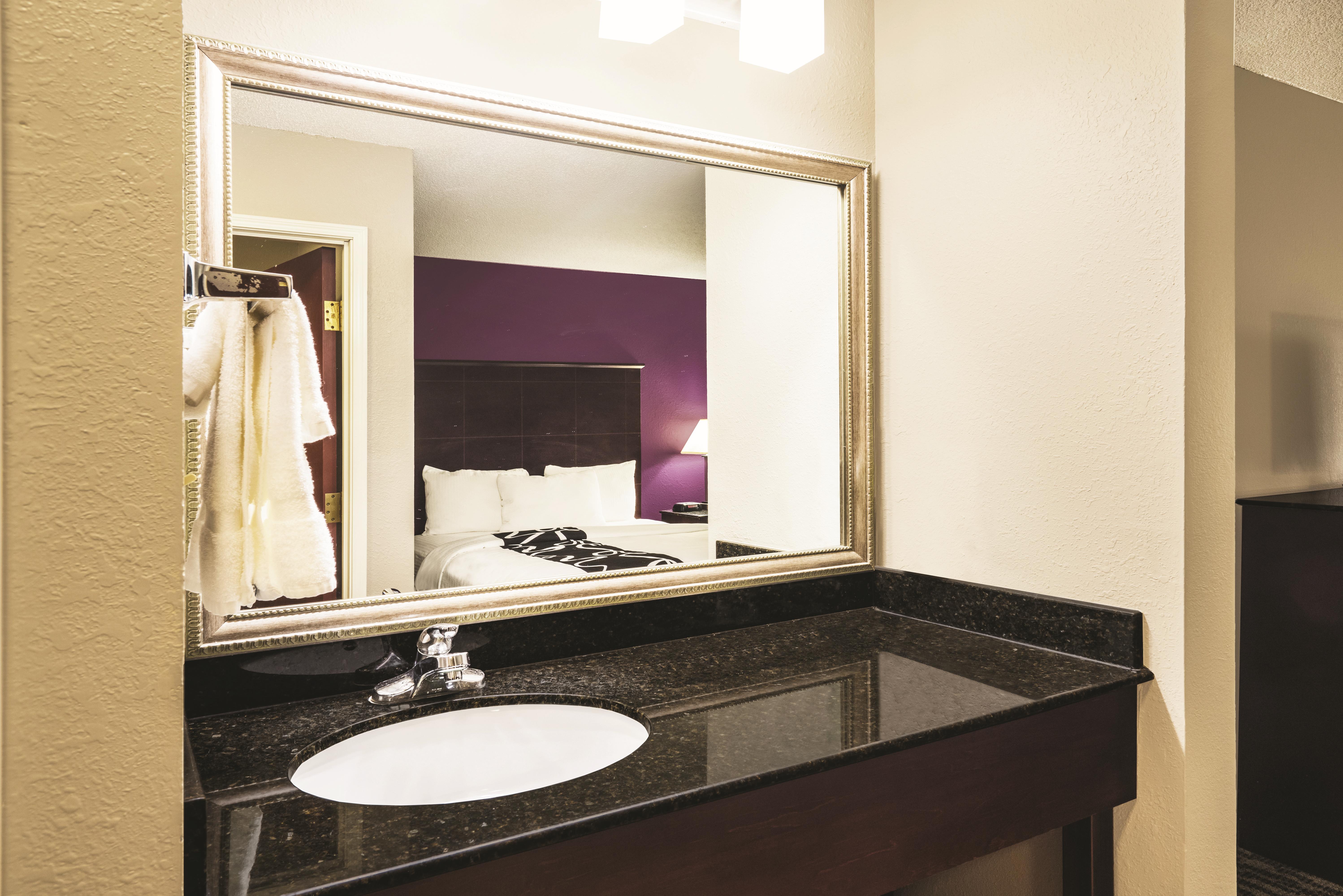 Guest room at the La Quinta Inn & Suites by Wyndham Louisville East in Louisville, Kentucky