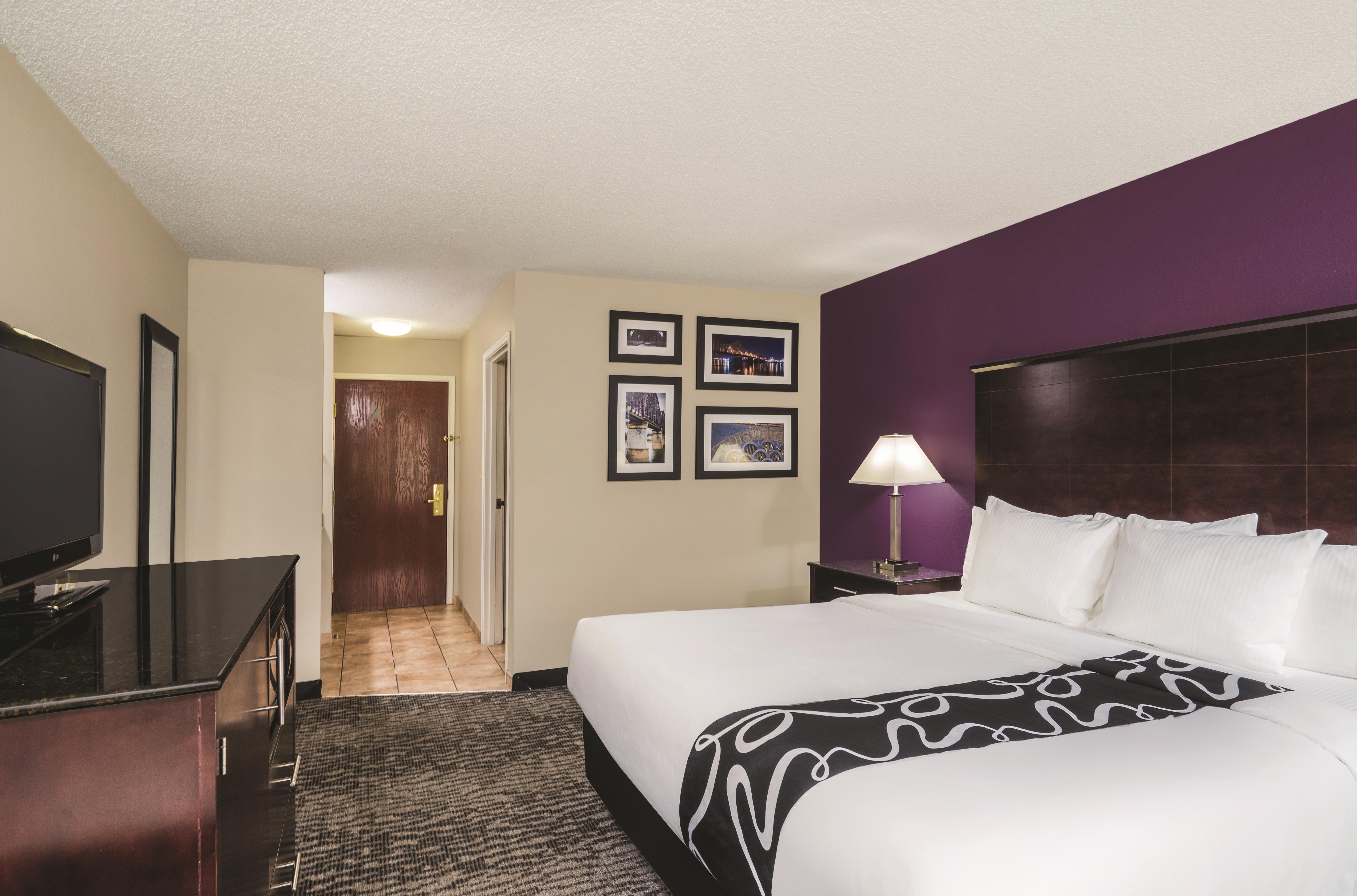 Guest room at the La Quinta Inn & Suites by Wyndham Louisville East in Louisville, Kentucky