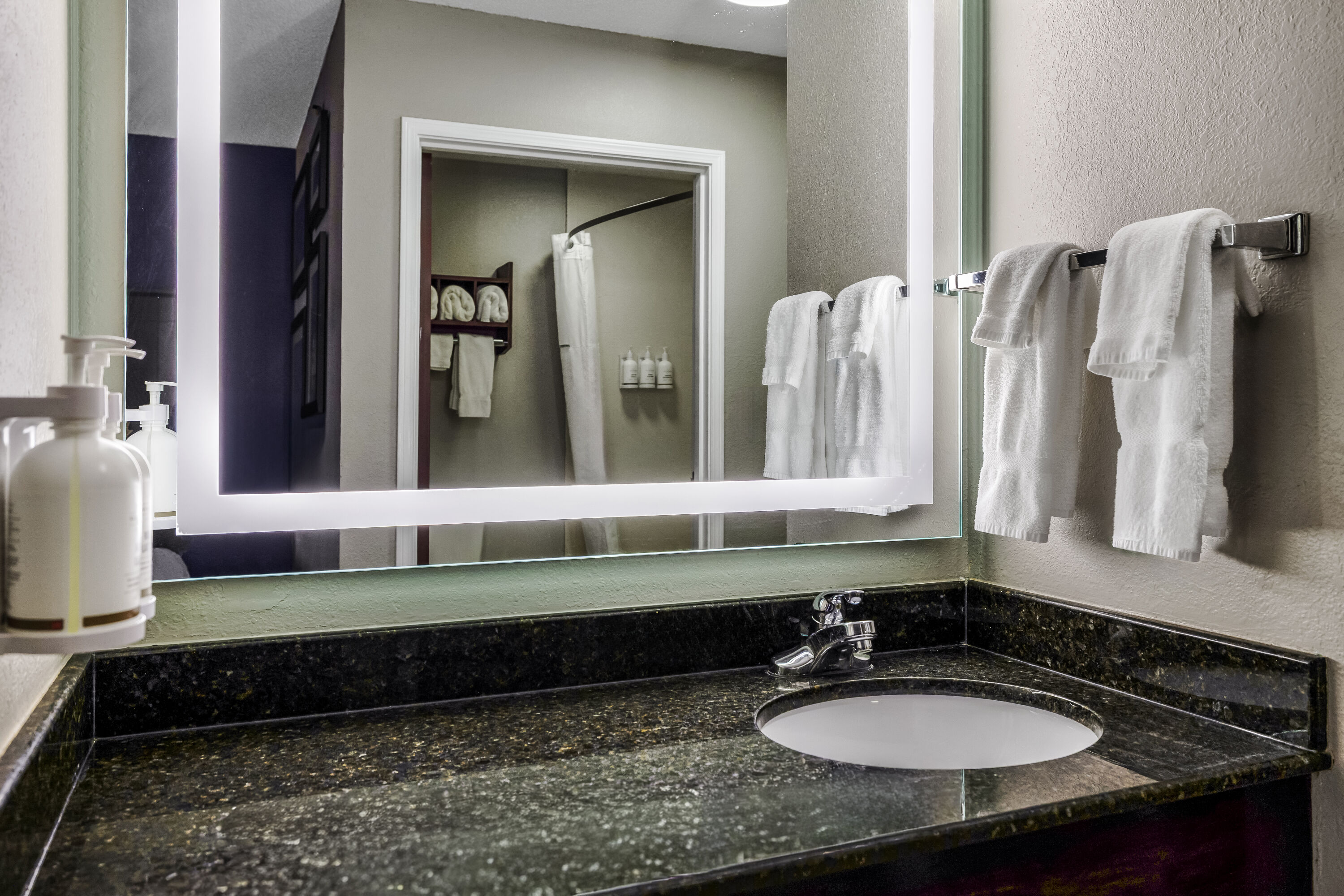 Guest room bath at the La Quinta Inn & Suites by Wyndham Louisville East in Louisville, Kentucky