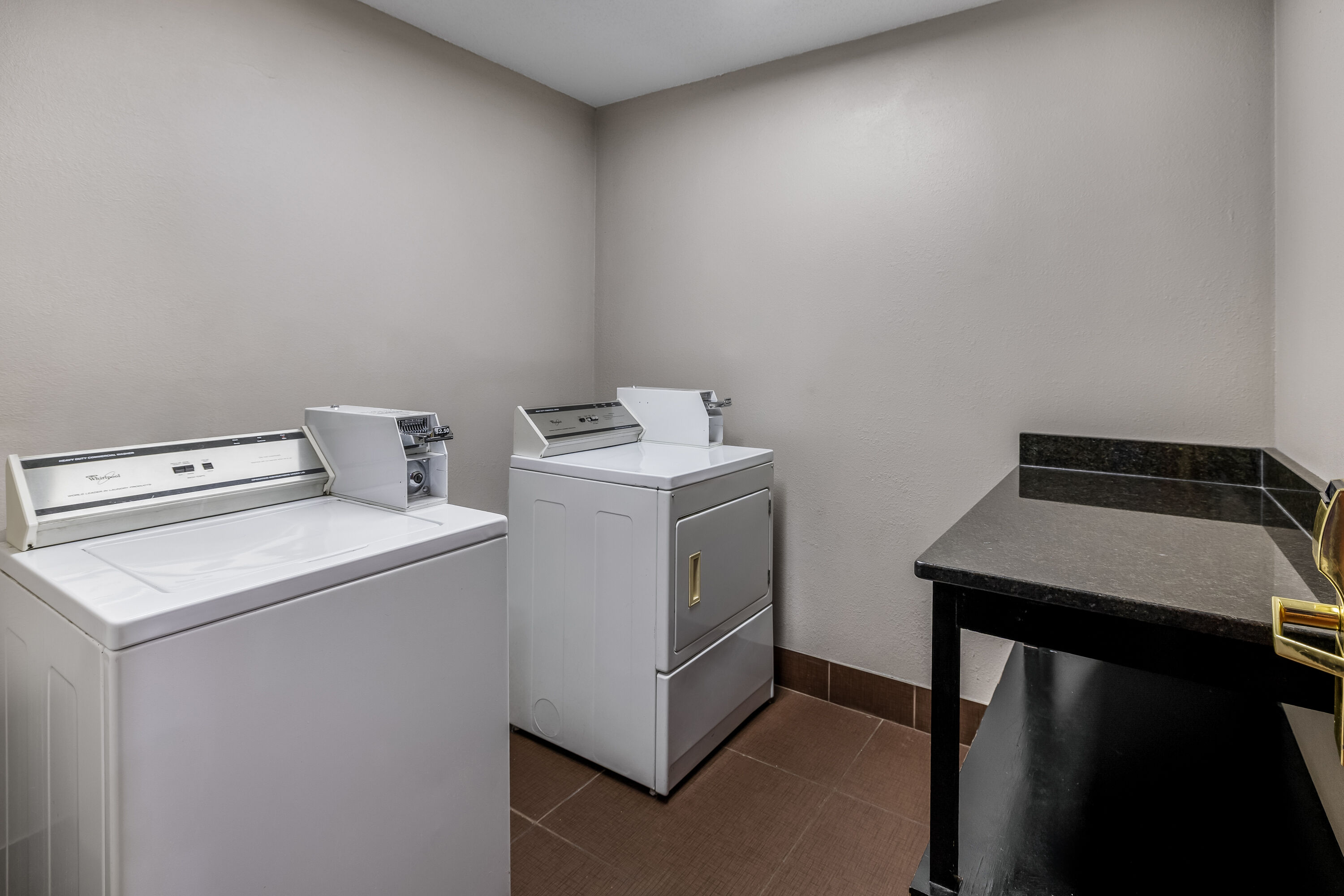 Laundry facilities at La Quinta Inn & Suites by Wyndham Louisville East in Louisville, Kentucky