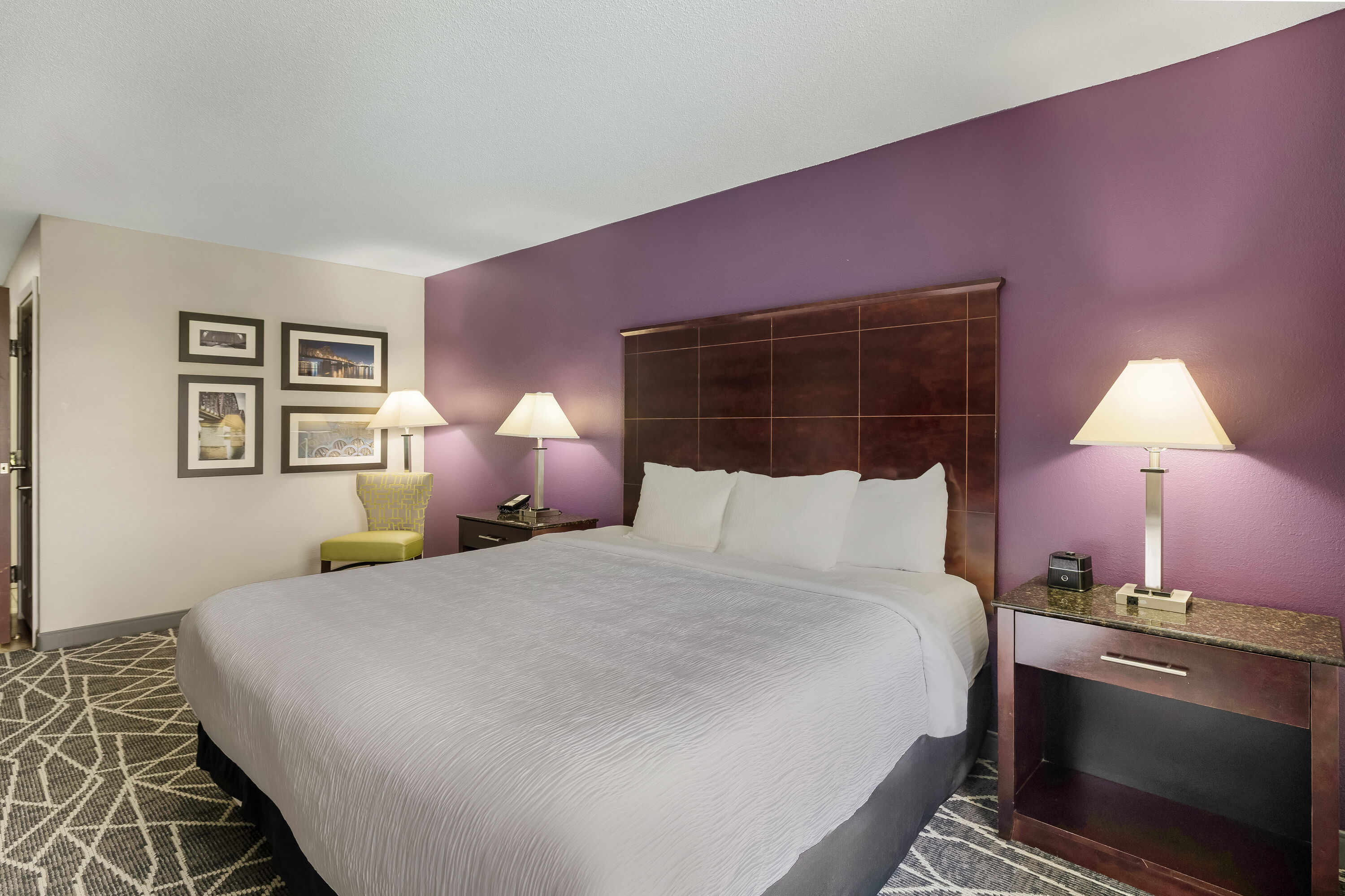 King bed guest room at the La Quinta Inn & Suites by Wyndham Louisville East in Louisville, Kentucky