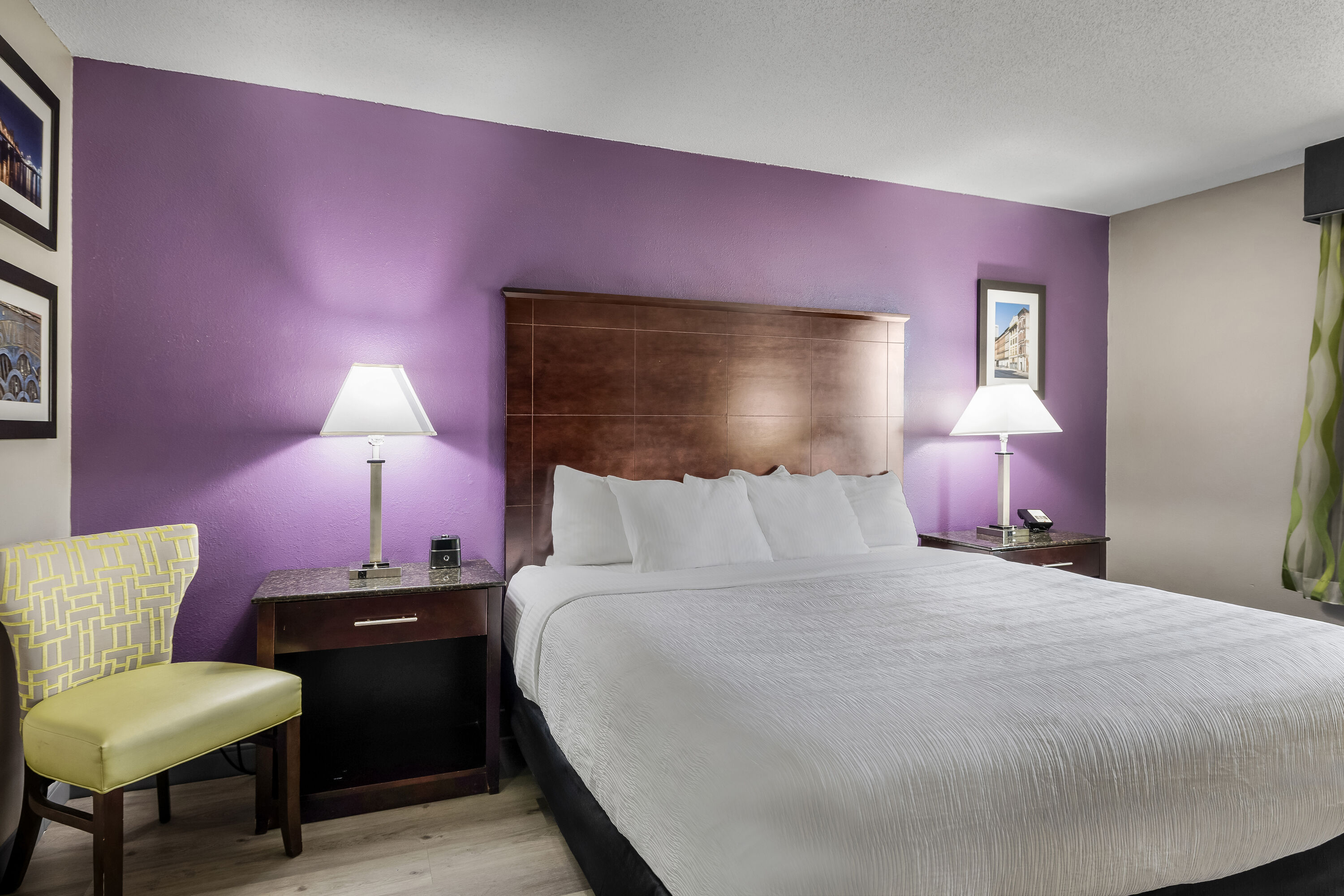 King bed guest room at the La Quinta Inn & Suites by Wyndham Louisville East in Louisville, Kentucky