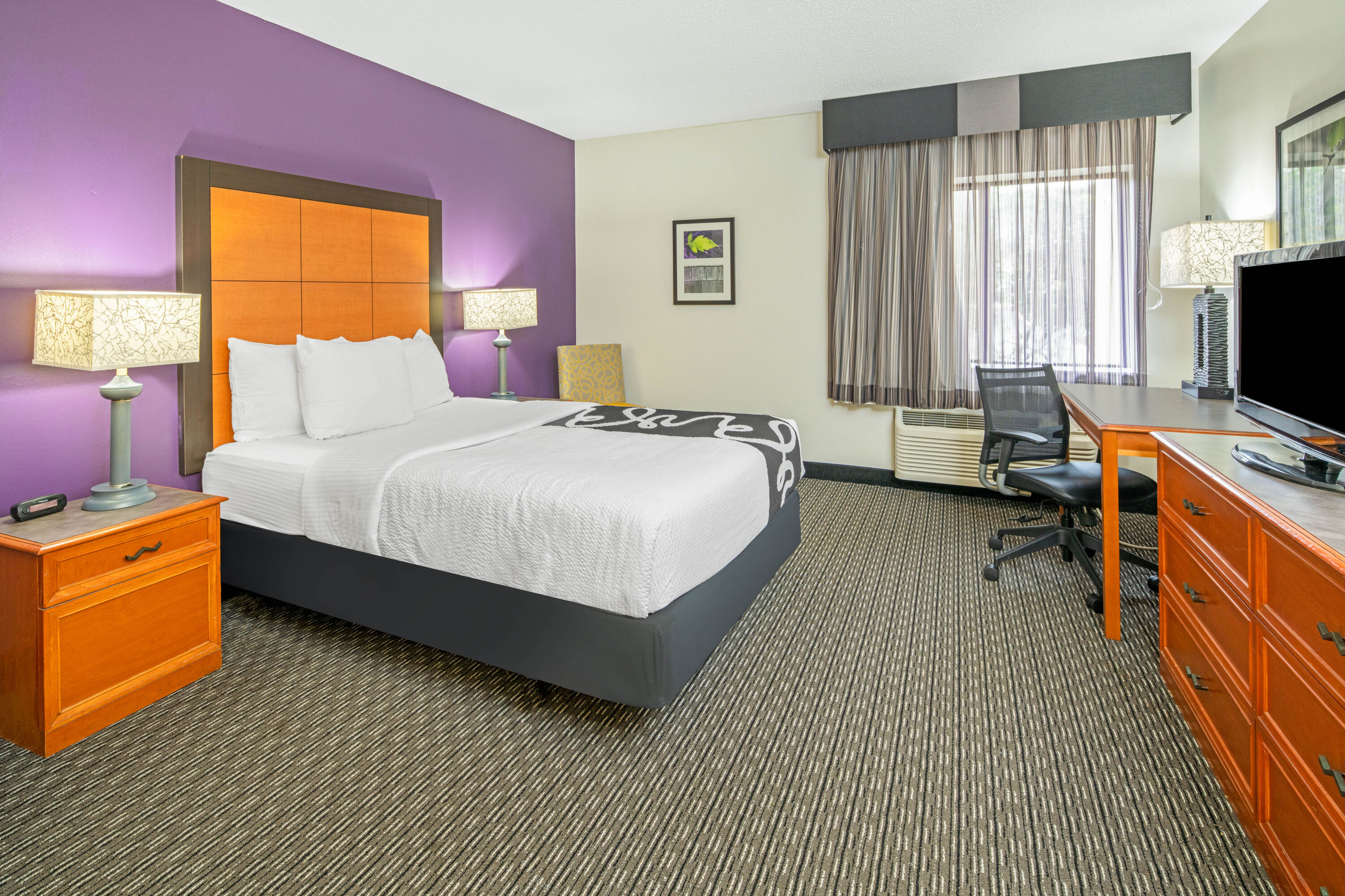 Guest room at the La Quinta Inn & Suites by Wyndham Baton Rouge Siegen Lane in Baton Rouge, Louisiana