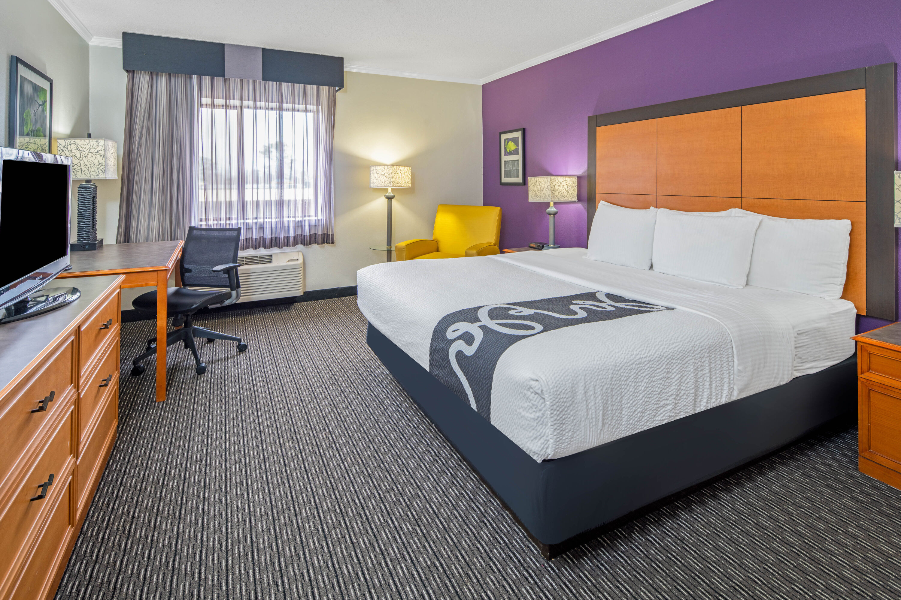 Guest room at the La Quinta Inn & Suites by Wyndham Baton Rouge Siegen Lane in Baton Rouge, Louisiana