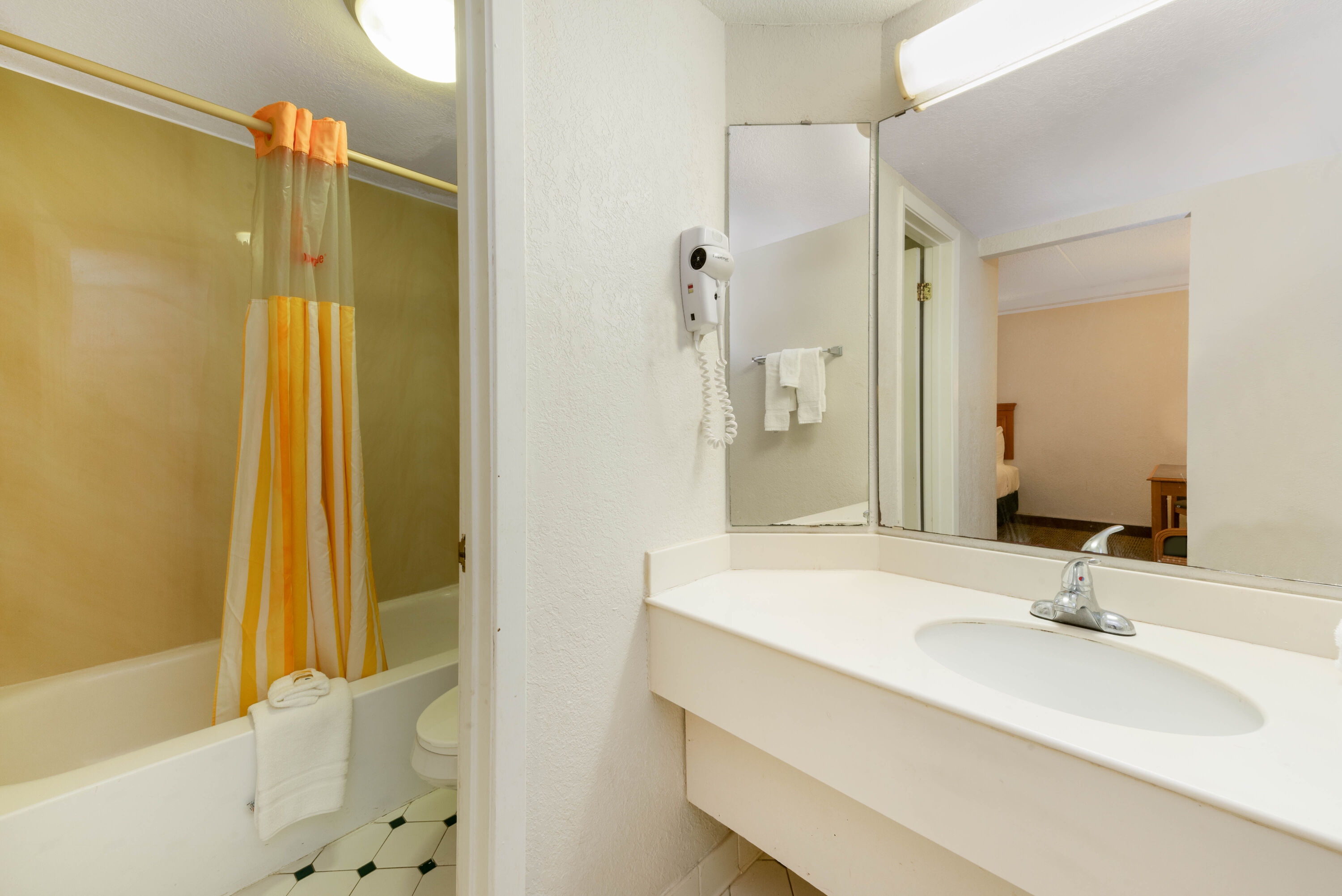 Guest room bath at the La Quinta Inn by Wyndham Bossier City in Bossier City, Louisiana
