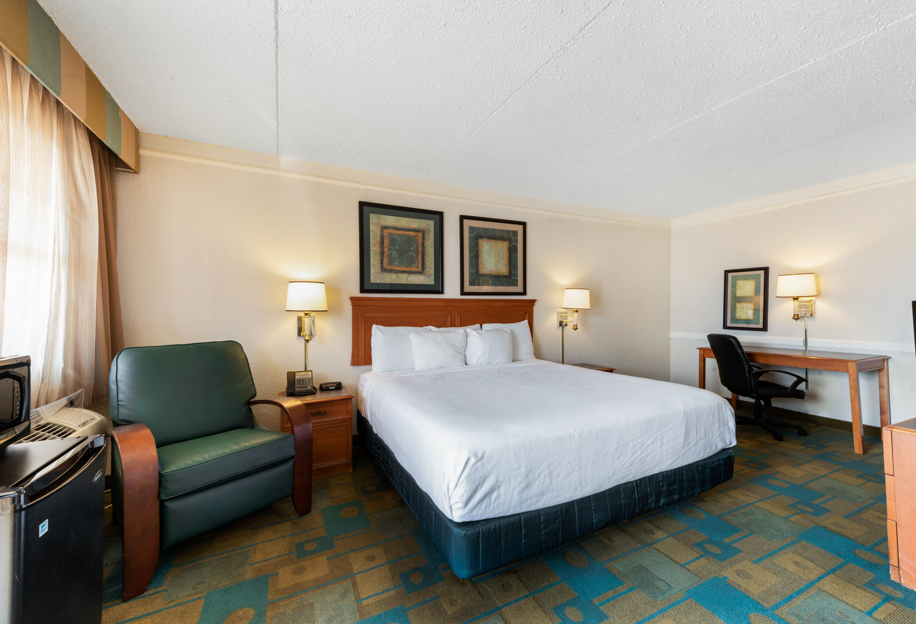 Guest room at the La Quinta Inn by Wyndham Bossier City in Bossier City, Louisiana