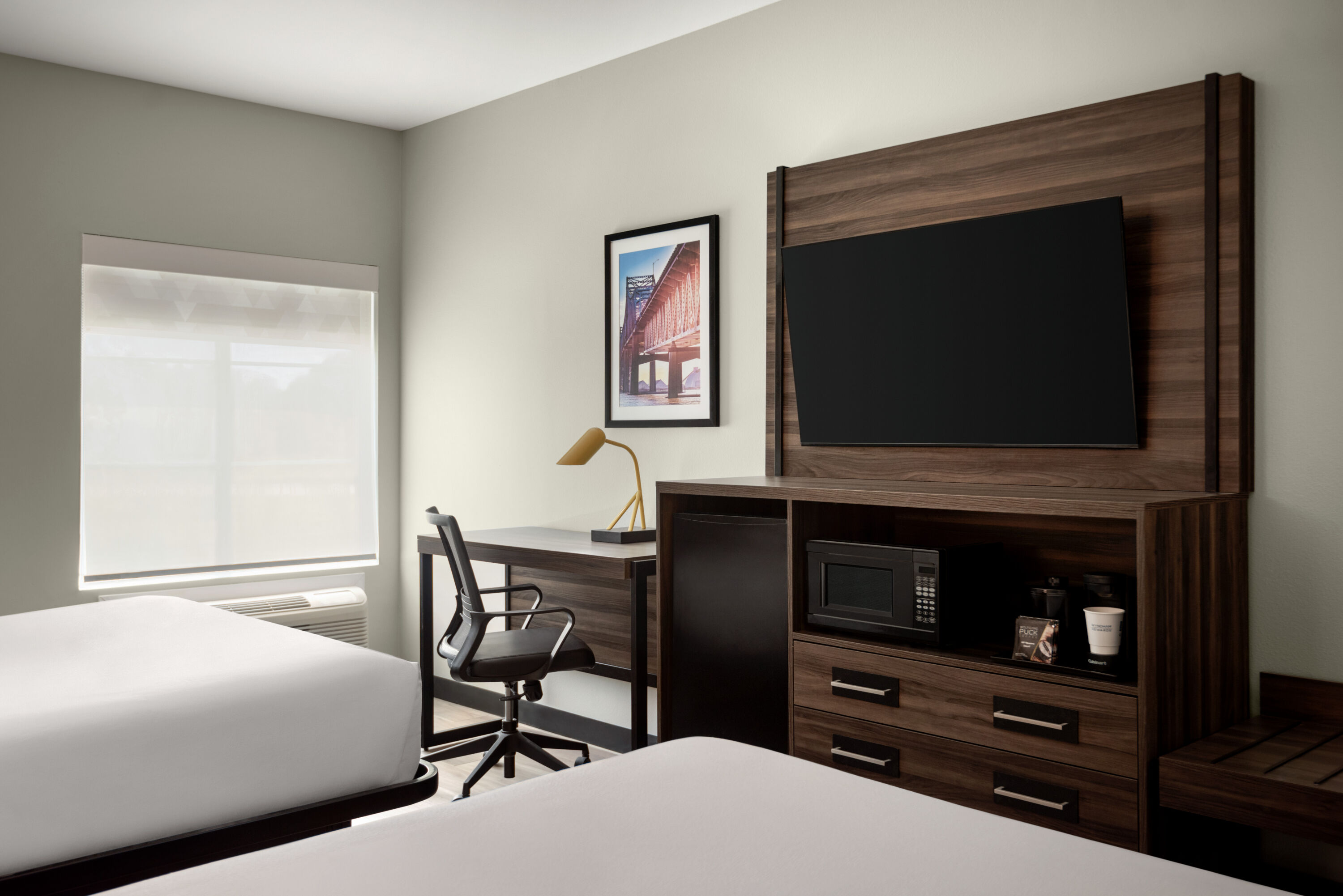 Guest room at the La Quinta Inn & Suites by Wyndham Gonzales LA in Gonzales, Louisiana