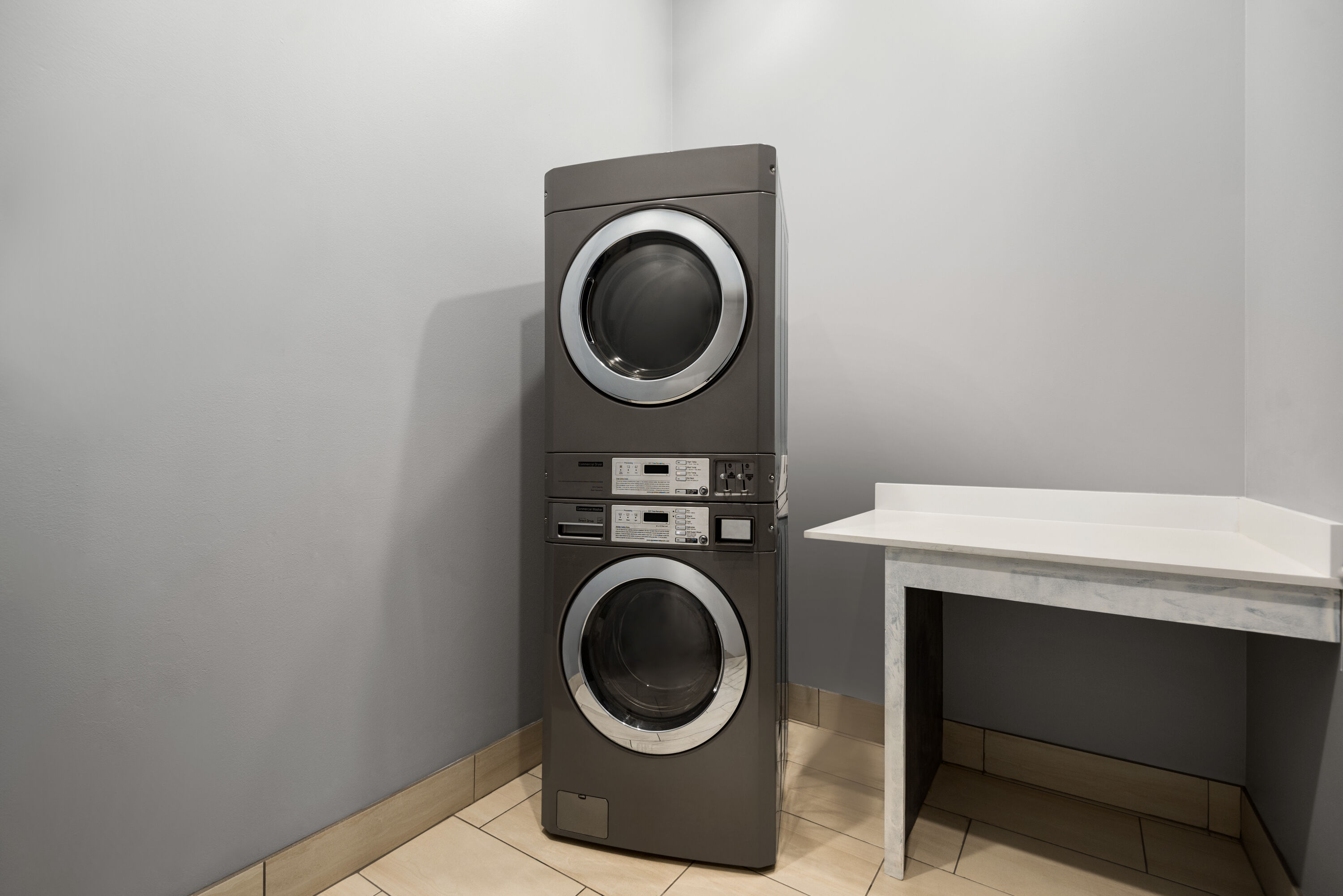 Laundry facilities at La Quinta Inn & Suites by Wyndham Gonzales LA in Gonzales, Louisiana