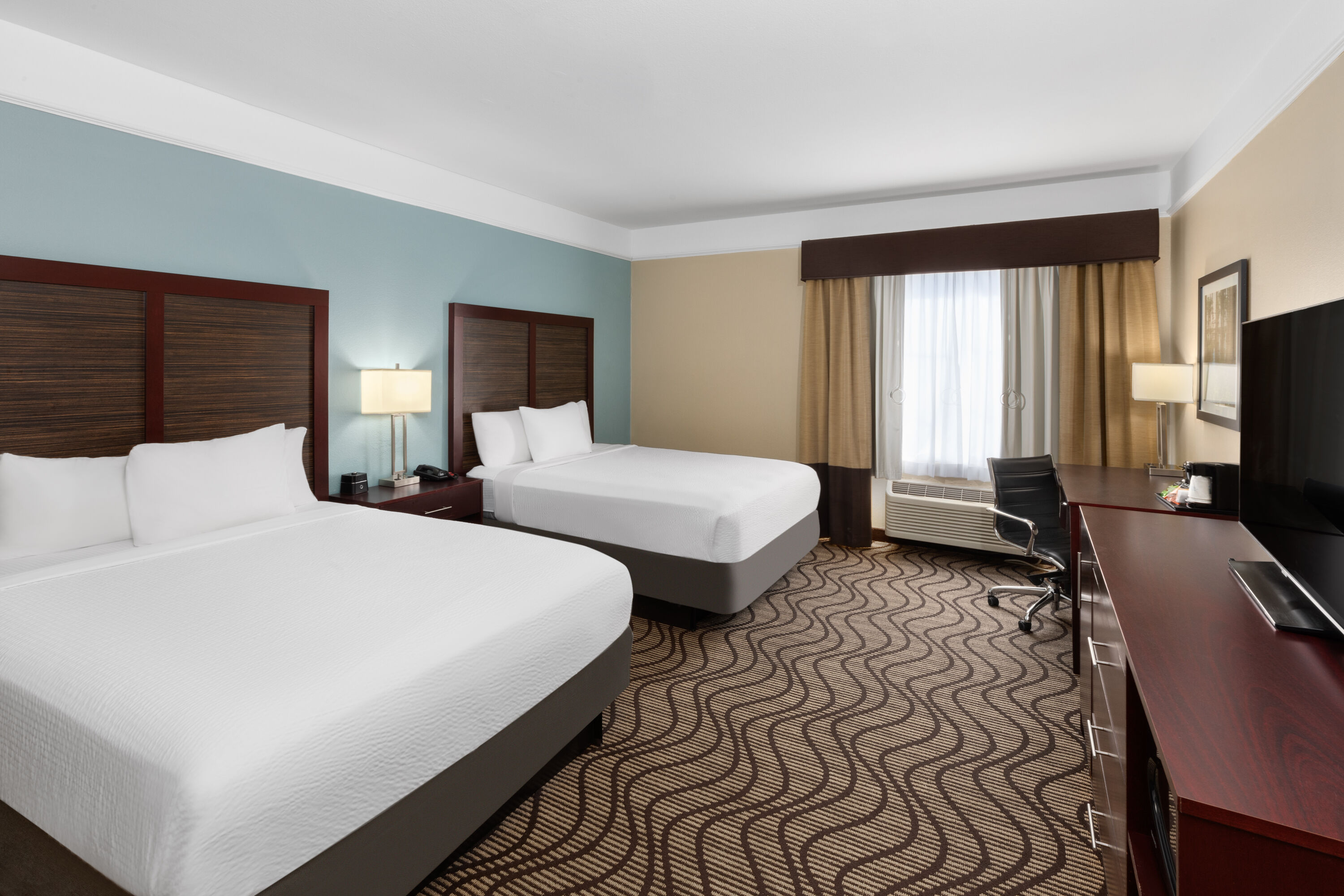 Guest room at the La Quinta Inn & Suites by Wyndham Houma in Houma, Louisiana