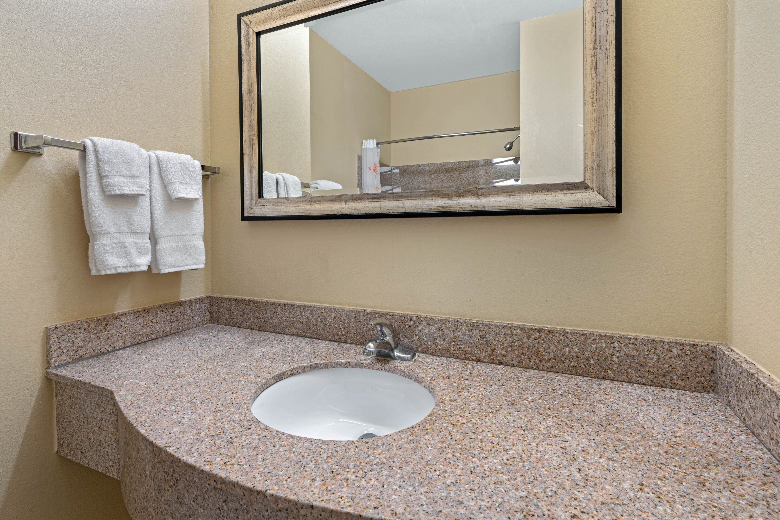 Guest room bath at the La Quinta Inn & Suites by Wyndham Morgan City in Morgan City, Louisiana