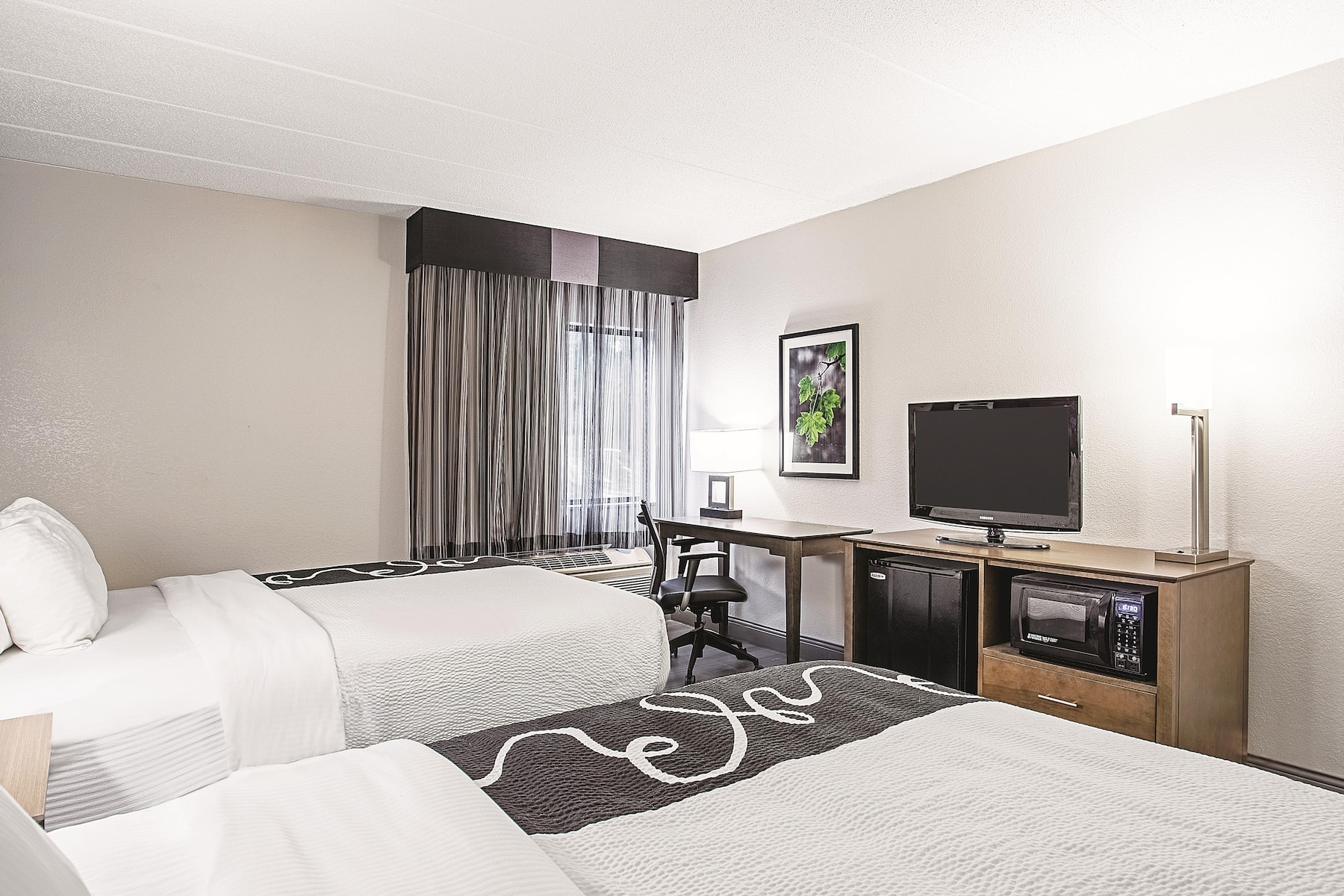Guest room at the La Quinta Inn & Suites by Wyndham Baltimore N / White Marsh in Baltimore, Maryland