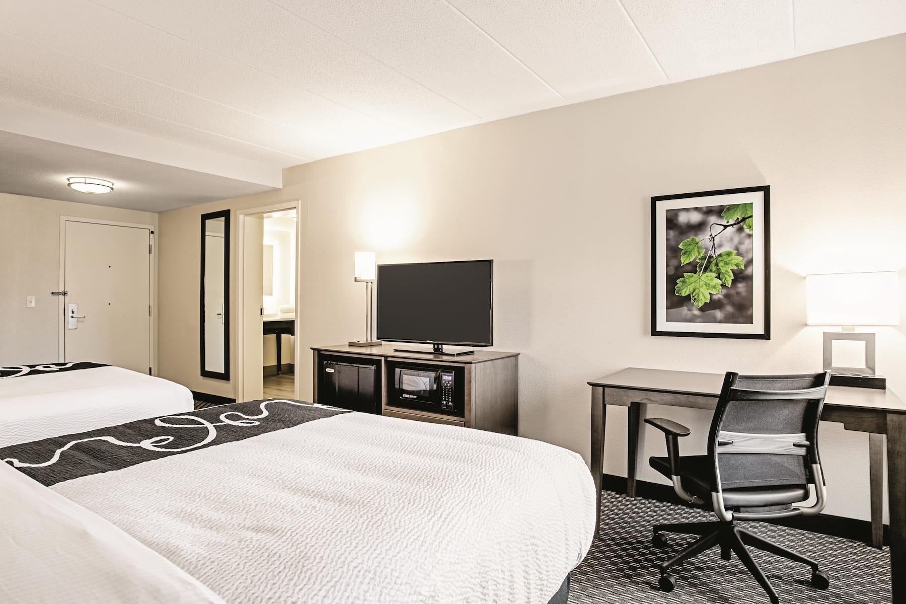 Guest room at the La Quinta Inn & Suites by Wyndham Baltimore N / White Marsh in Baltimore, Maryland