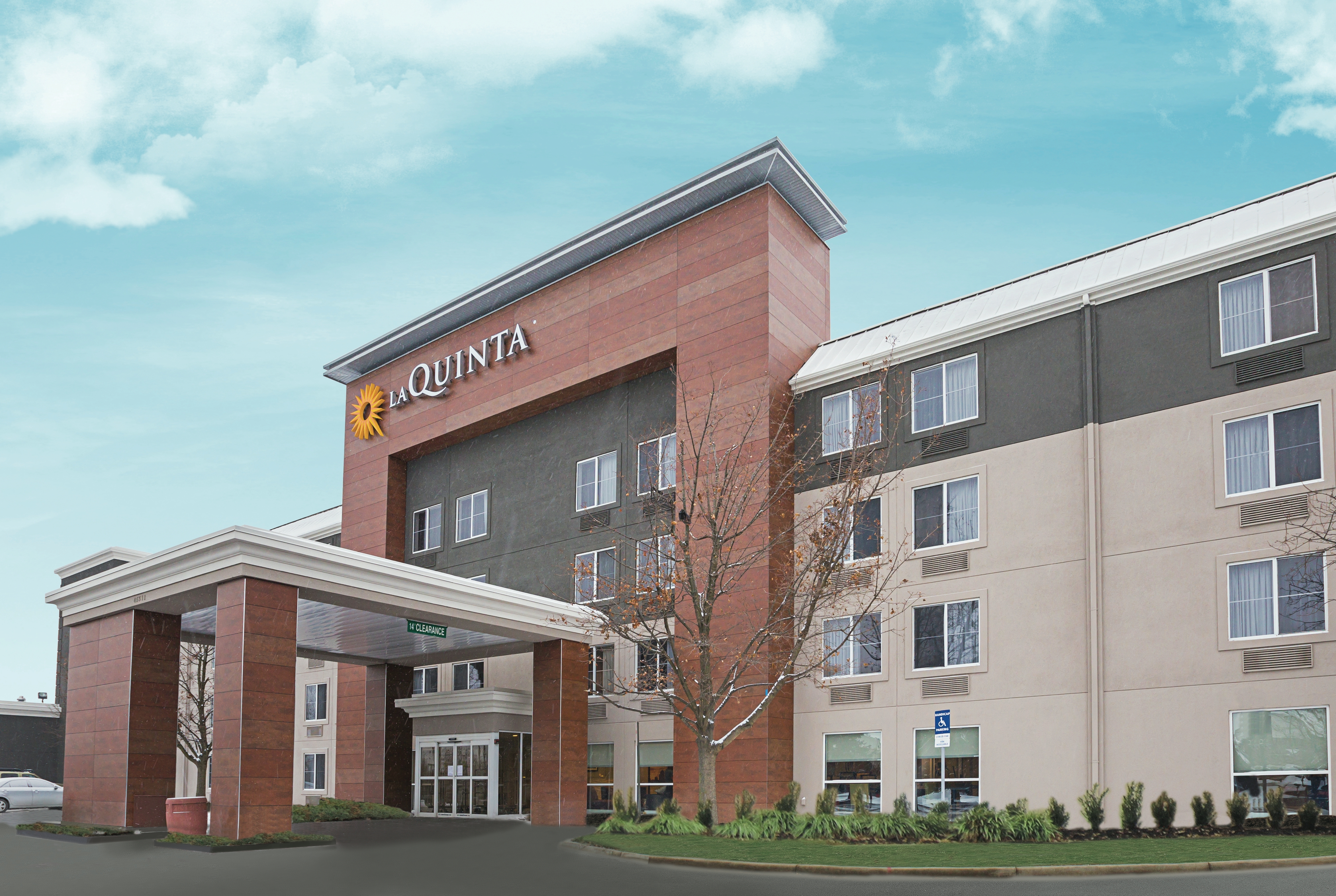 Exterior of La Quinta Inn & Suites by Wyndham Detroit Utica hotel in Utica, Michigan