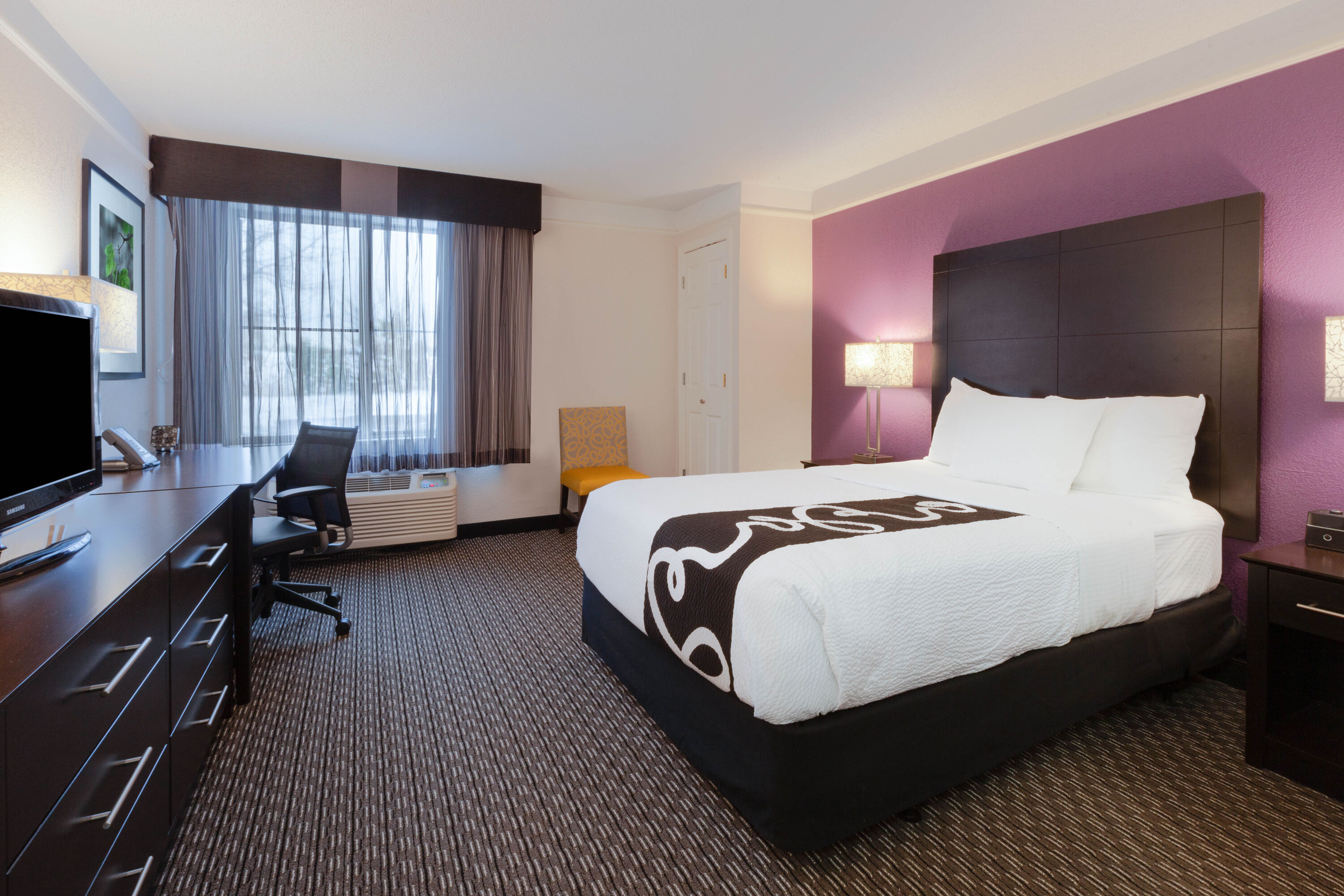 Guest room at the La Quinta Inn & Suites by Wyndham Detroit Utica in Utica, Michigan