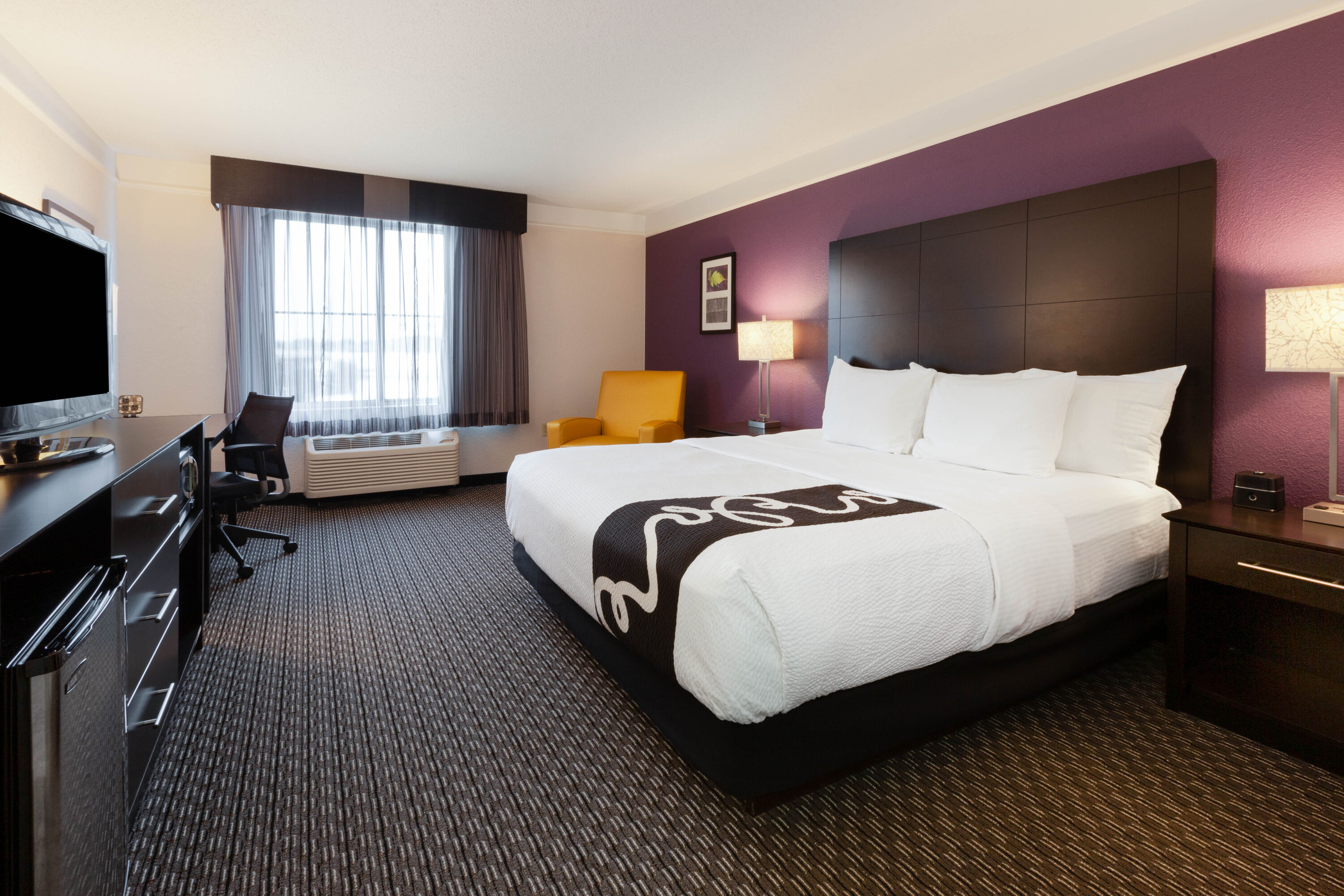 Guest room at the La Quinta Inn & Suites by Wyndham Detroit Utica in Utica, Michigan