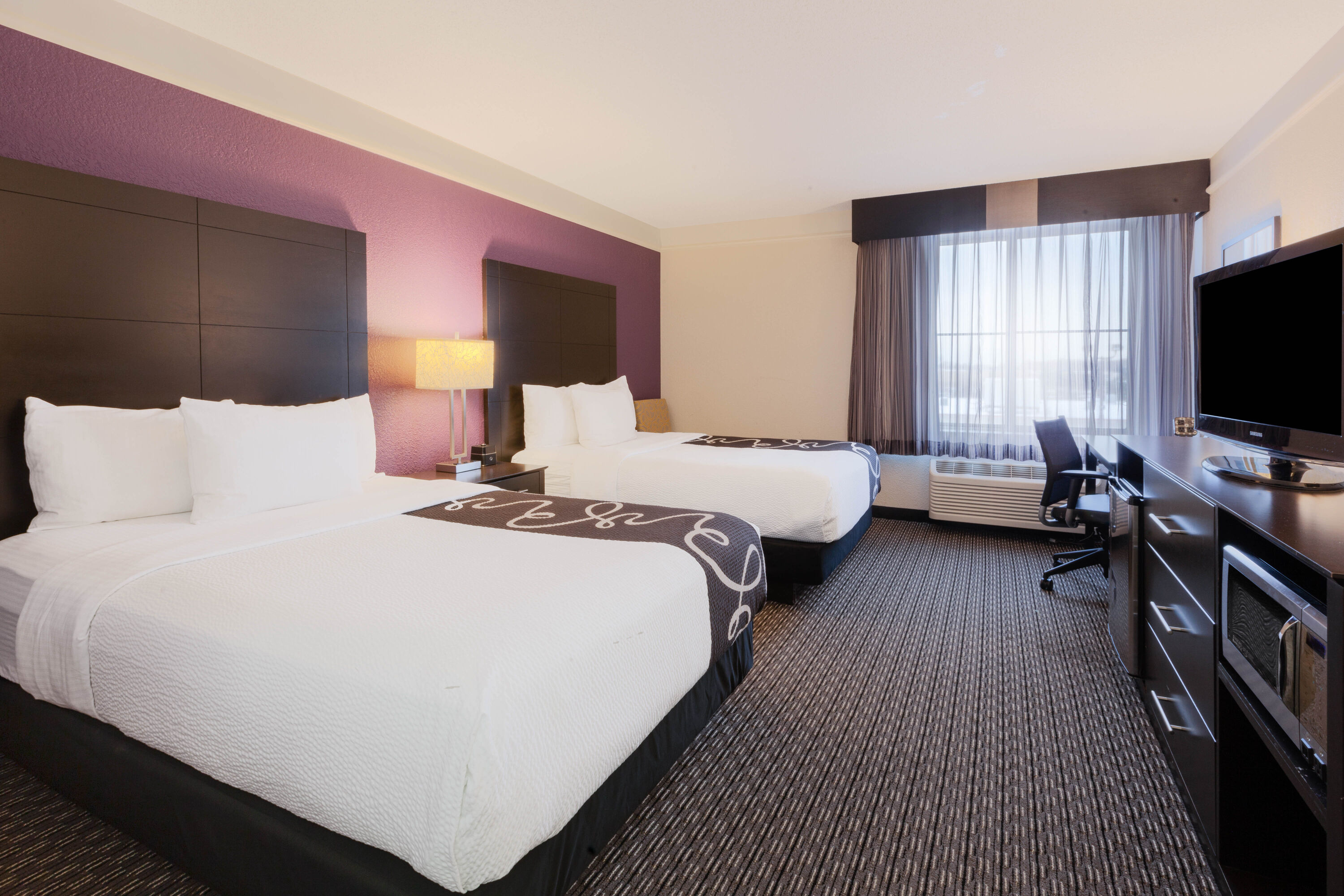 Guest room at the La Quinta Inn & Suites by Wyndham Detroit Utica in Utica, Michigan