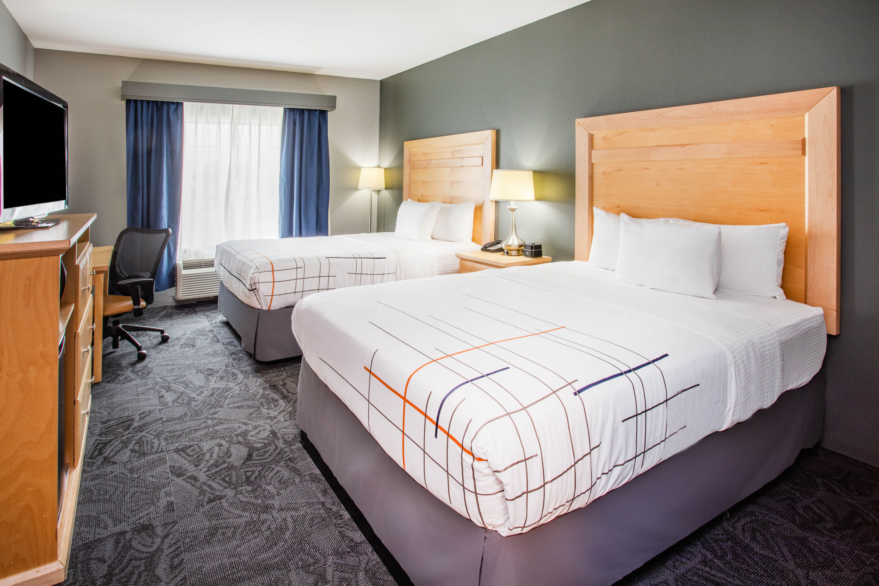 Guest room at the La Quinta Inn & Suites by Wyndham Rochester Mayo Clinic S in Rochester, Minnesota