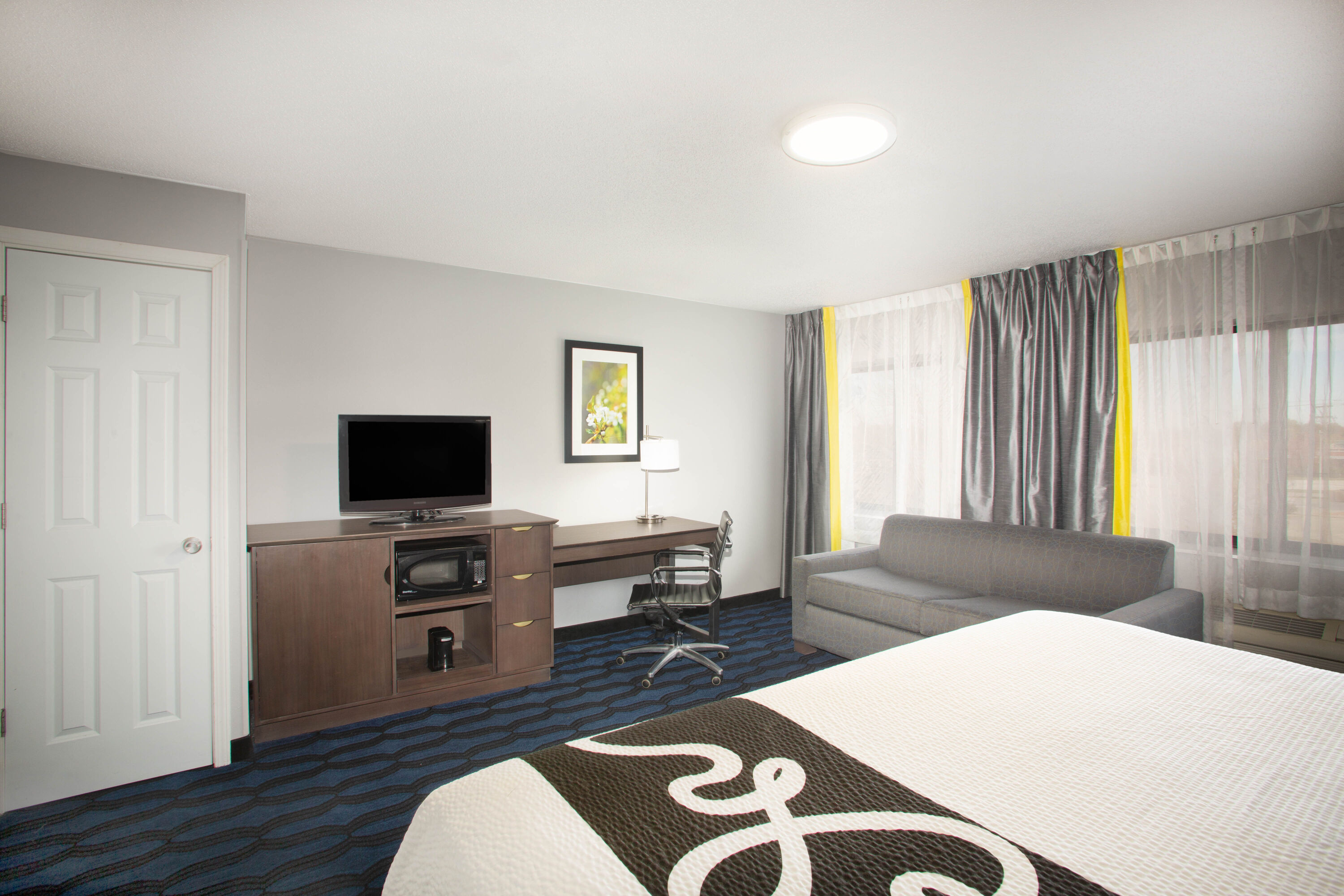 Guest room at the La Quinta Inn by Wyndham St. Louis Hazelwood - Airport North in Hazelwood, Missouri