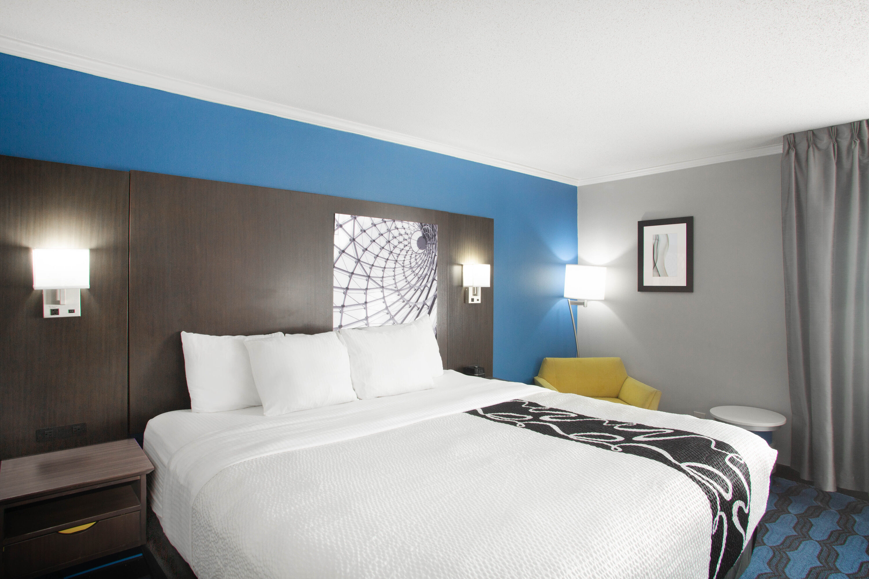 Guest room at the La Quinta Inn by Wyndham St. Louis Hazelwood - Airport North in Hazelwood, Missouri