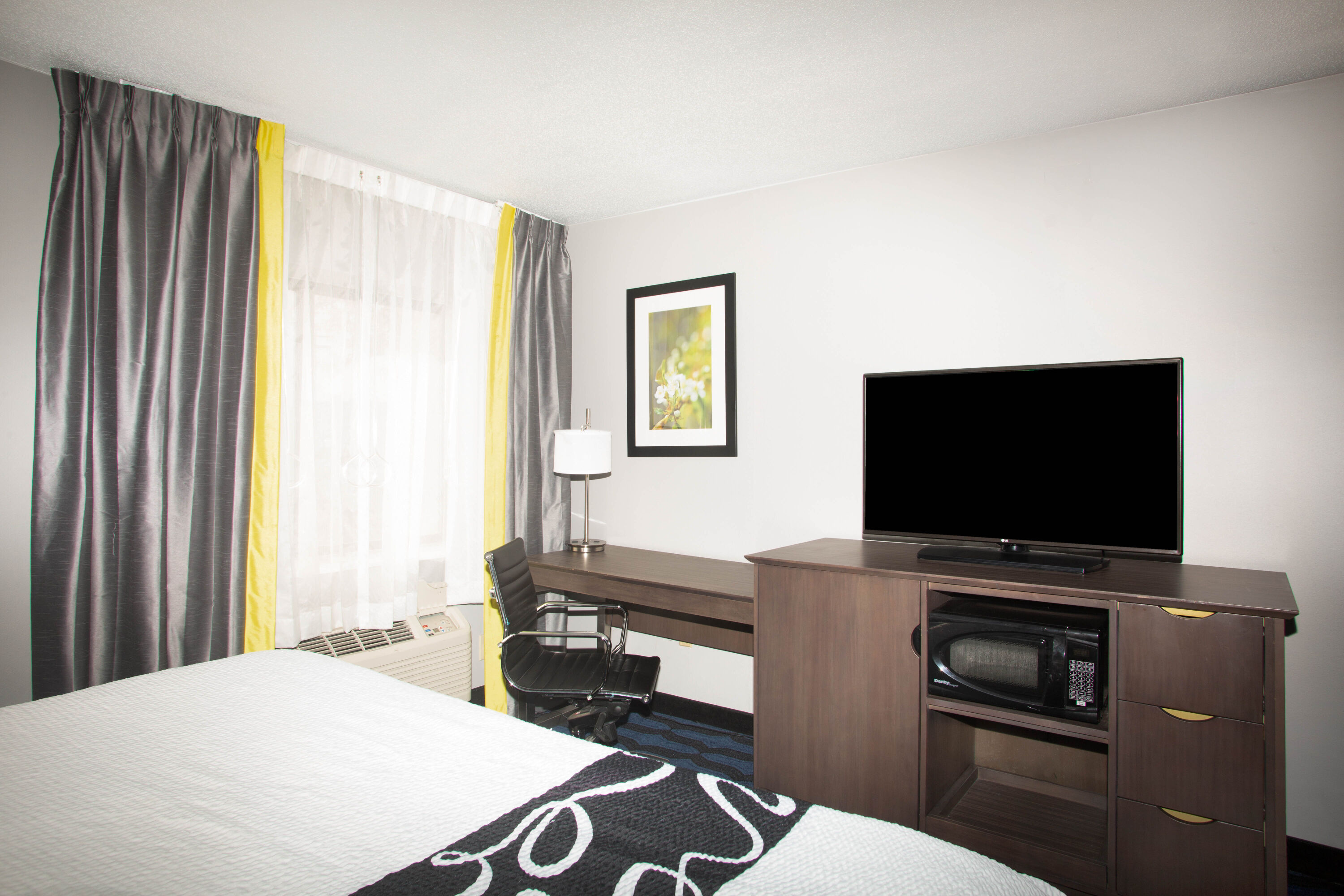 Guest room at the La Quinta Inn by Wyndham St. Louis Hazelwood - Airport North in Hazelwood, Missouri