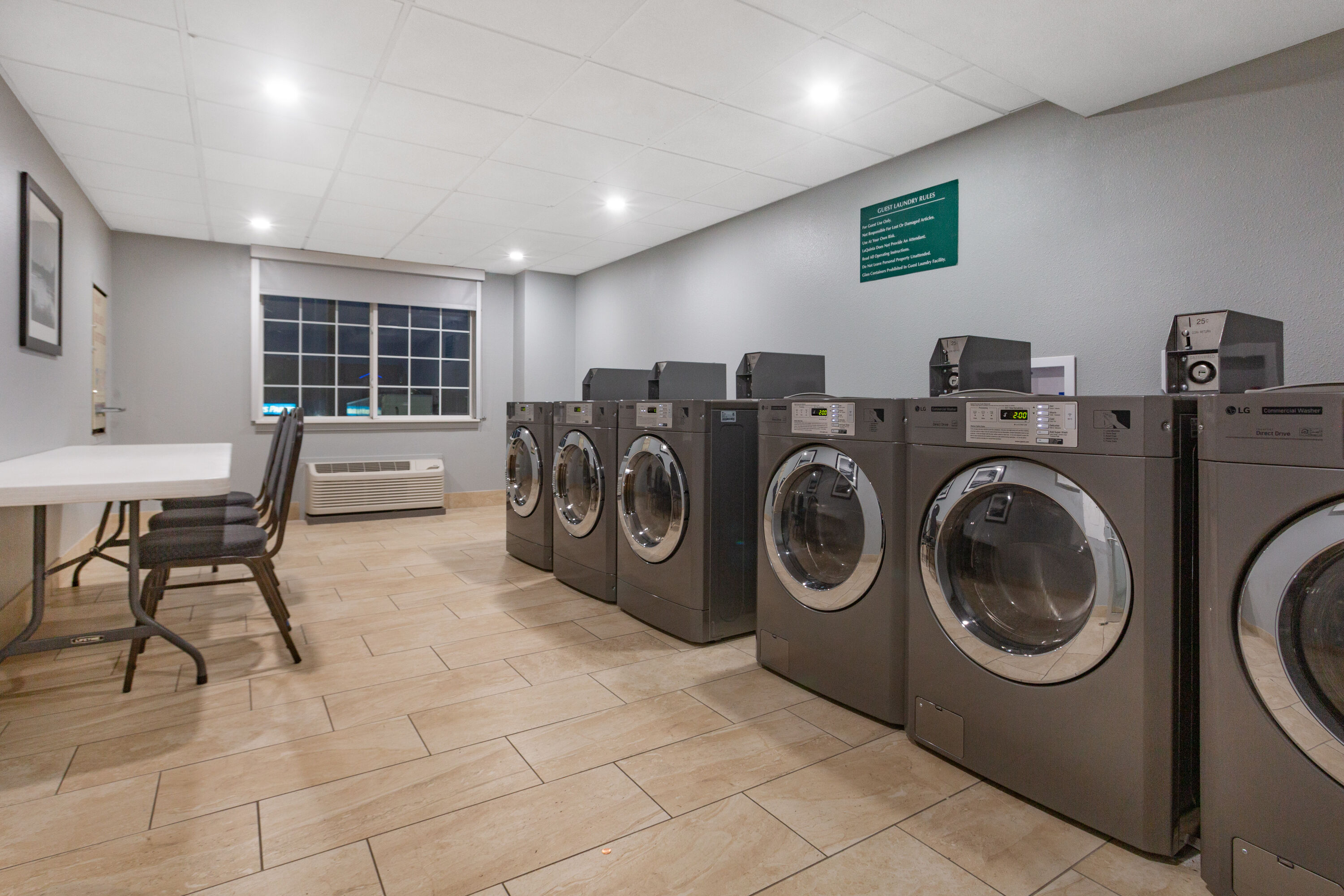 Laundry facilities at La Quinta Inn & Suites by Wyndham Joplin in Joplin, Missouri