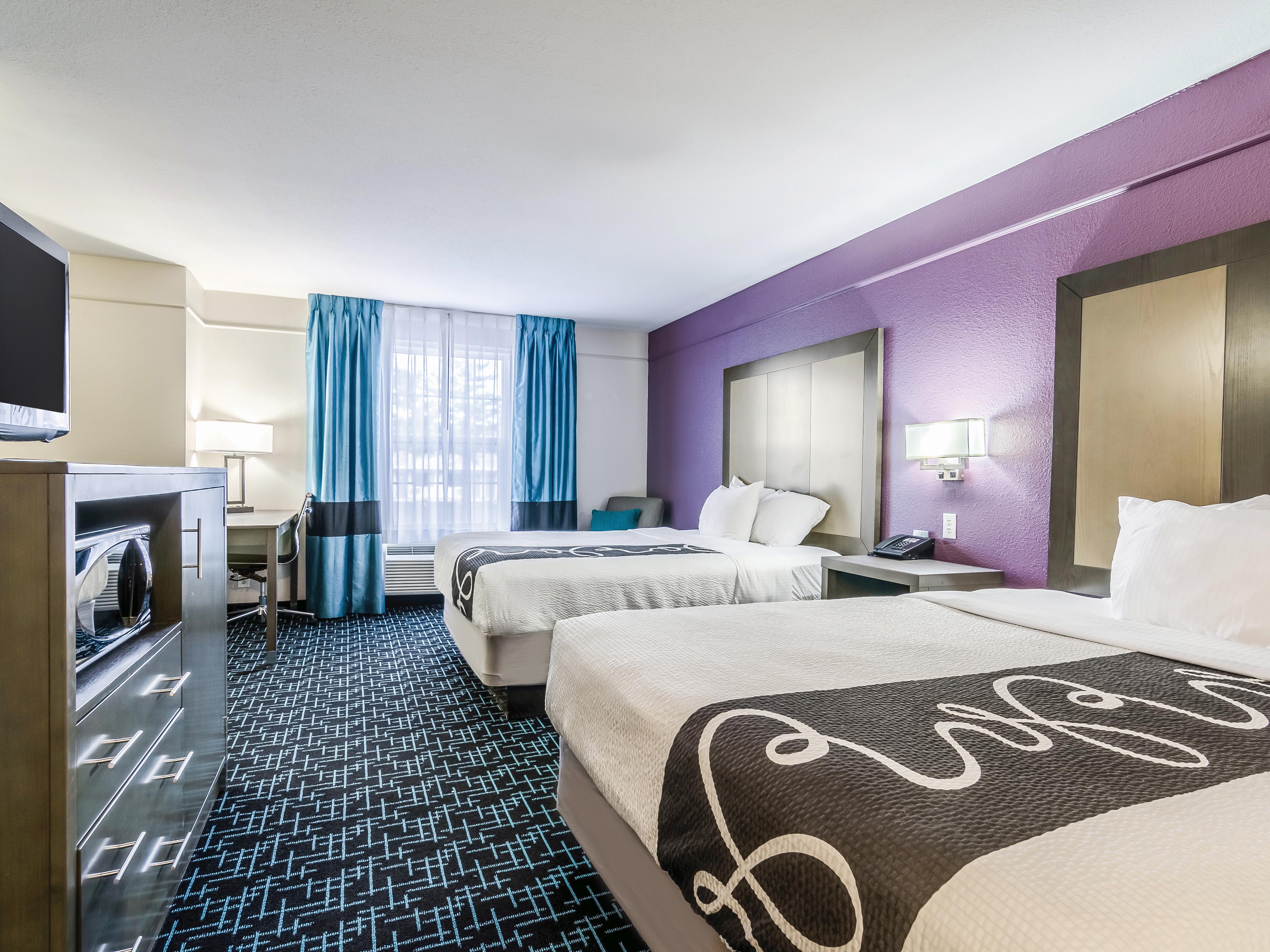 Guest room at the La Quinta Inn & Suites by Wyndham Kansas City Airport in Kansas City, Missouri