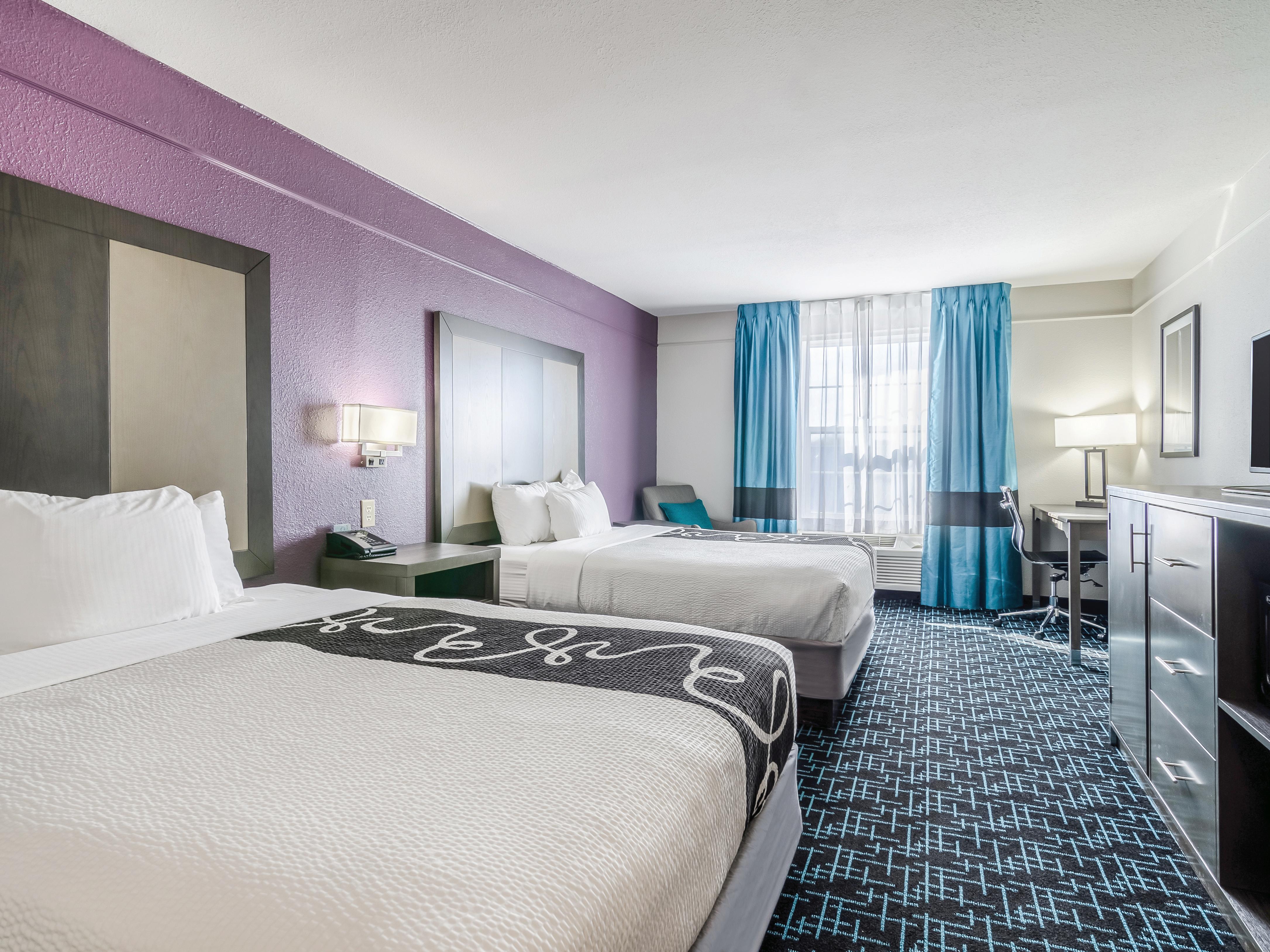 Guest room at the La Quinta Inn & Suites by Wyndham Kansas City Airport in Kansas City, Missouri