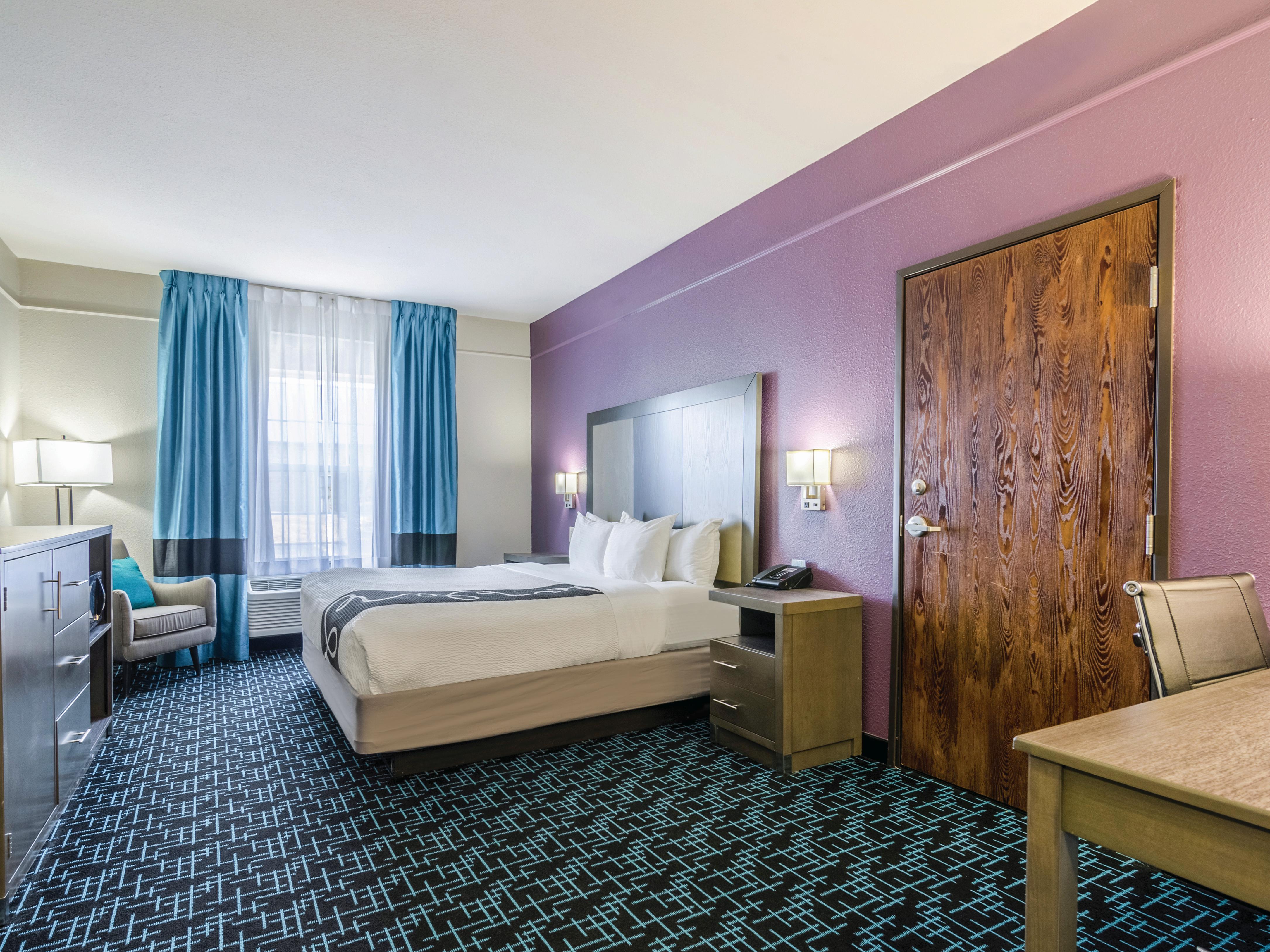 Guest room at the La Quinta Inn & Suites by Wyndham Kansas City Airport in Kansas City, Missouri