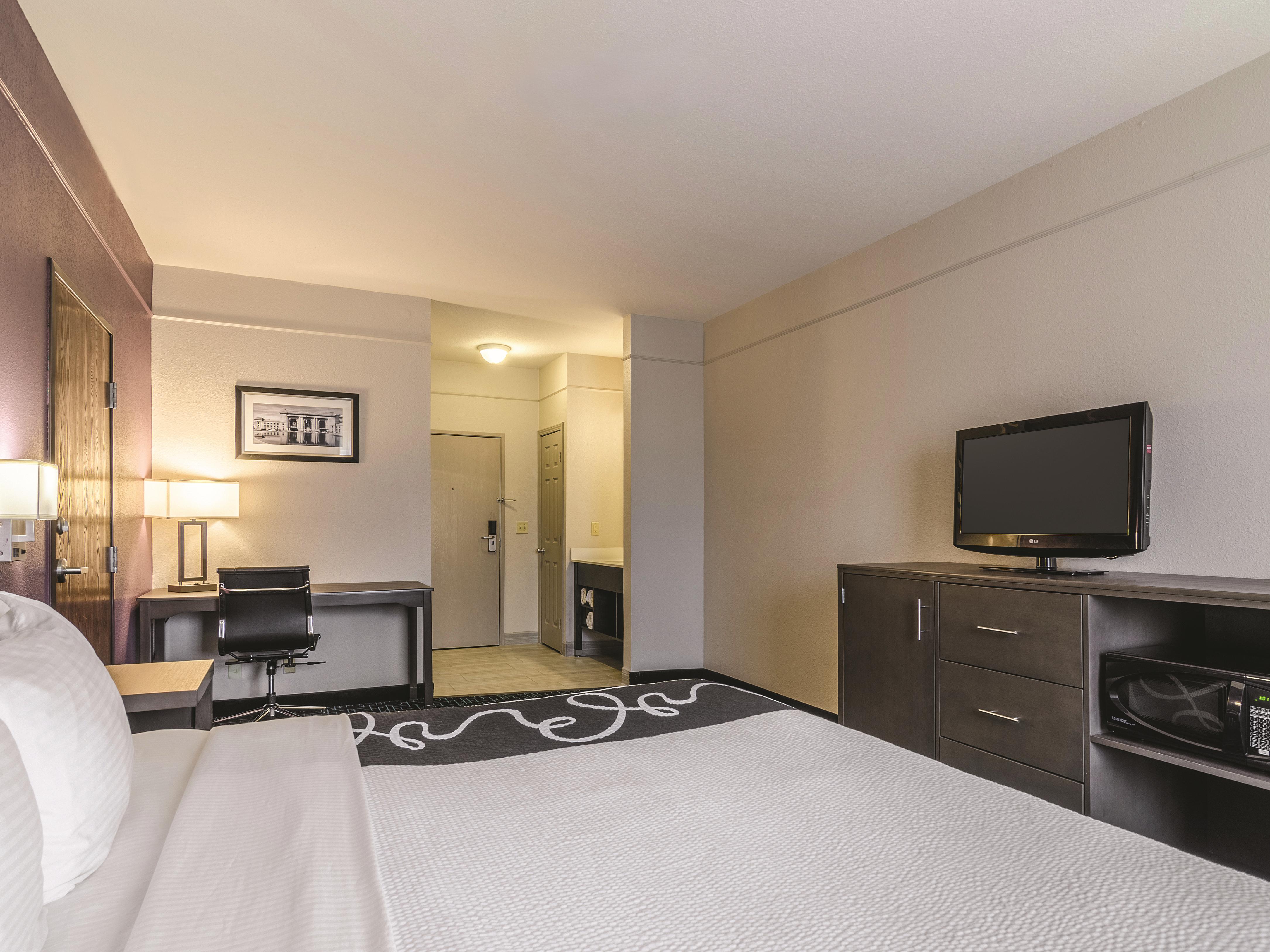 Guest room at the La Quinta Inn & Suites by Wyndham Kansas City Airport in Kansas City, Missouri