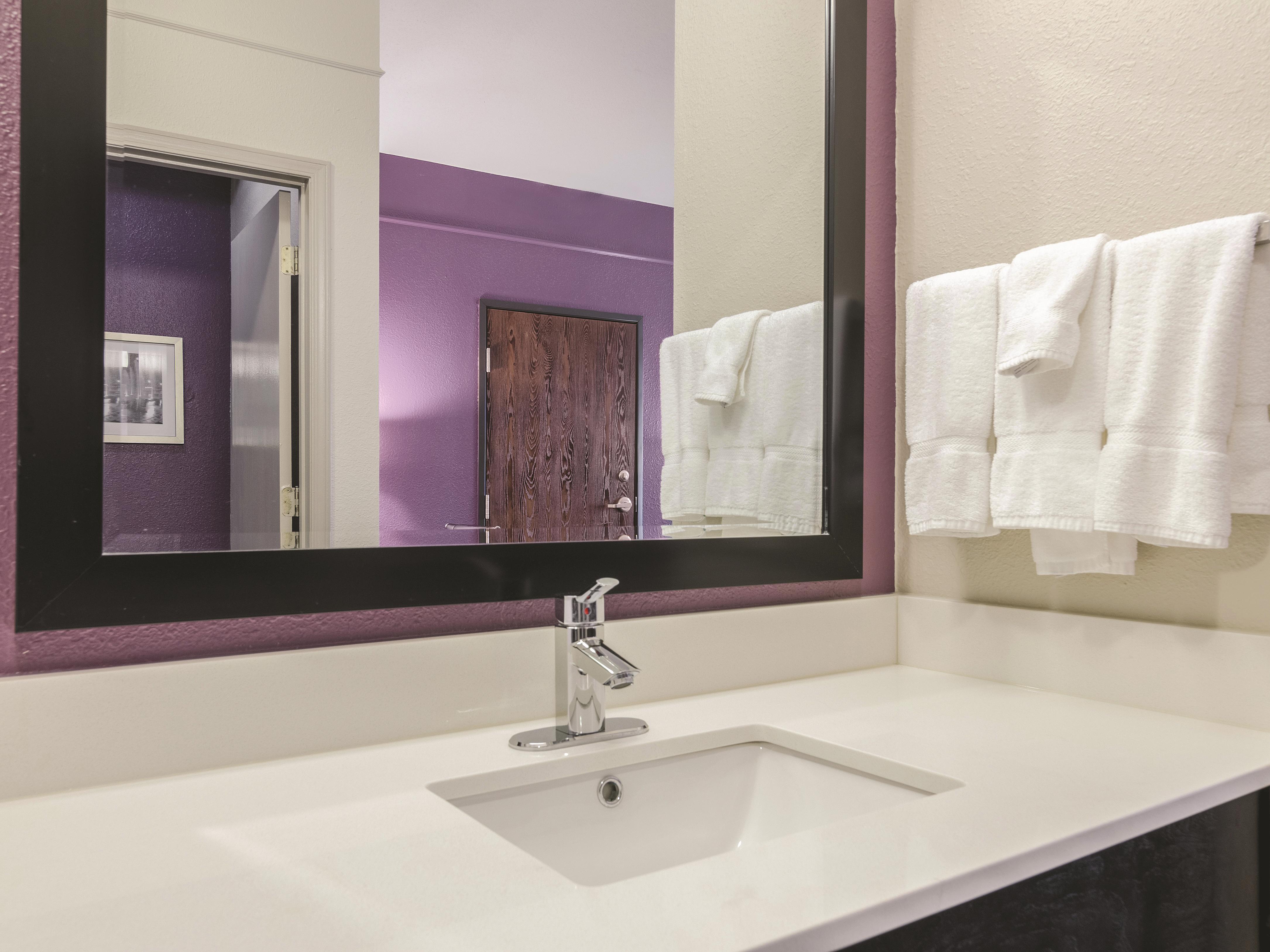 Guest room at the La Quinta Inn & Suites by Wyndham Kansas City Airport in Kansas City, Missouri