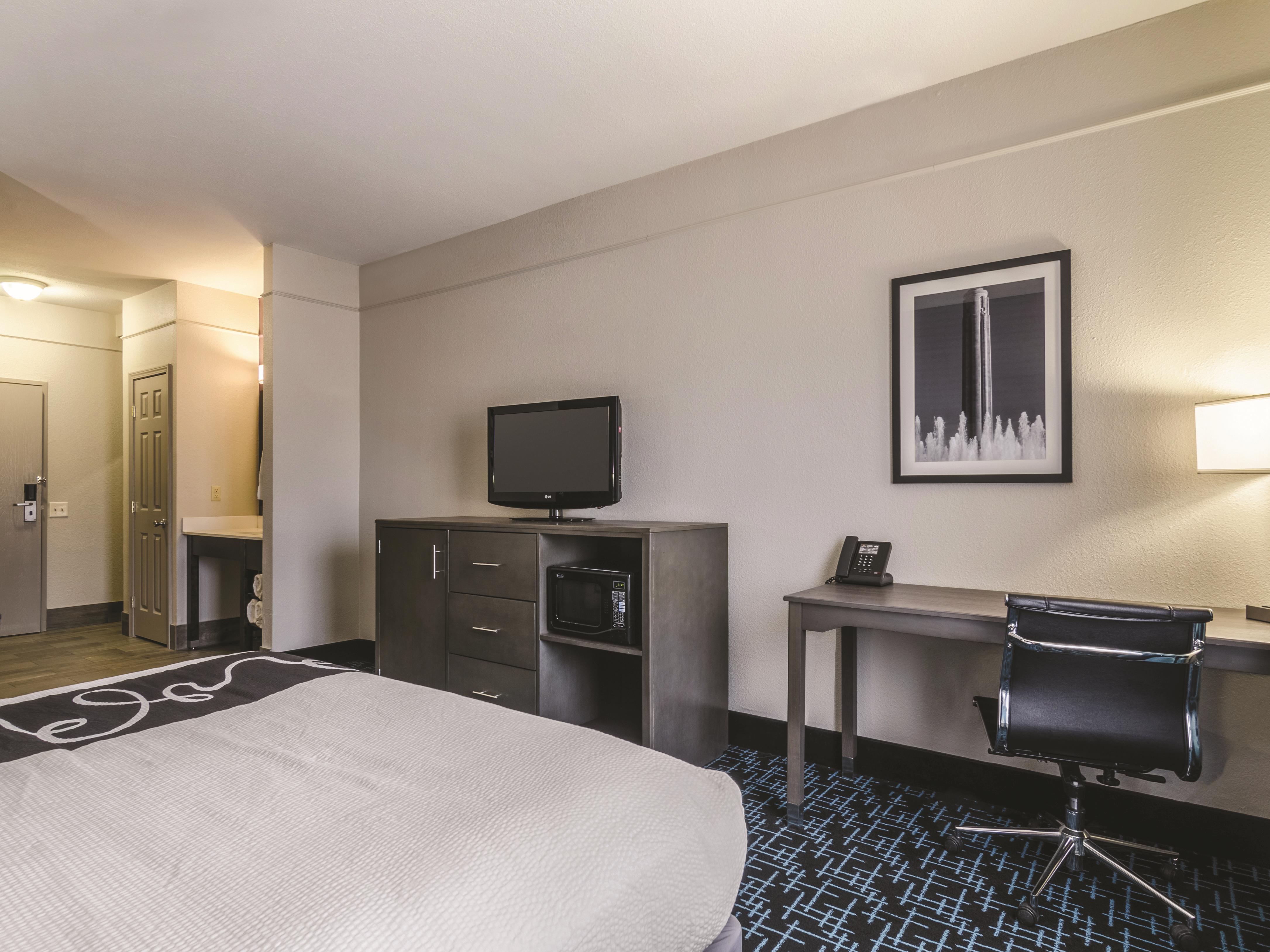 Guest room at the La Quinta Inn & Suites by Wyndham Kansas City Airport in Kansas City, Missouri