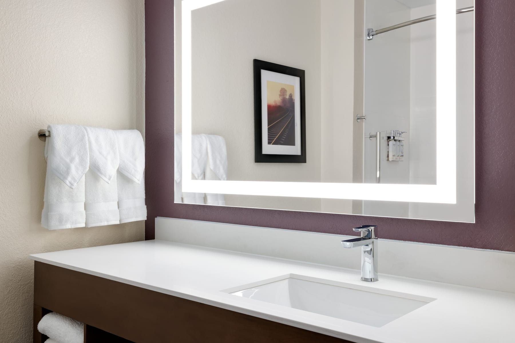 Guest room at the La Quinta Inn & Suites by Wyndham Springfield Airport Plaza in Springfield, Missouri