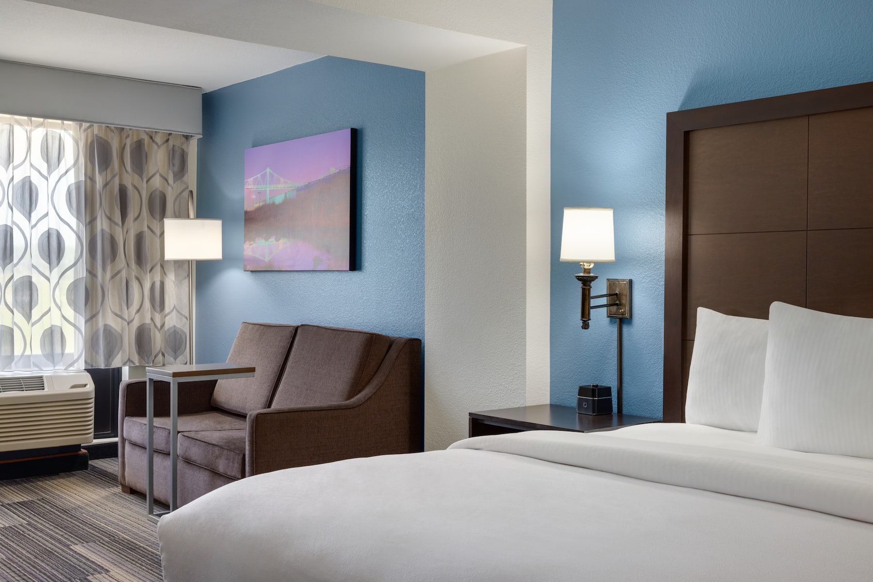 Guest room at the La Quinta Inn & Suites by Wyndham Springfield Airport Plaza in Springfield, Missouri