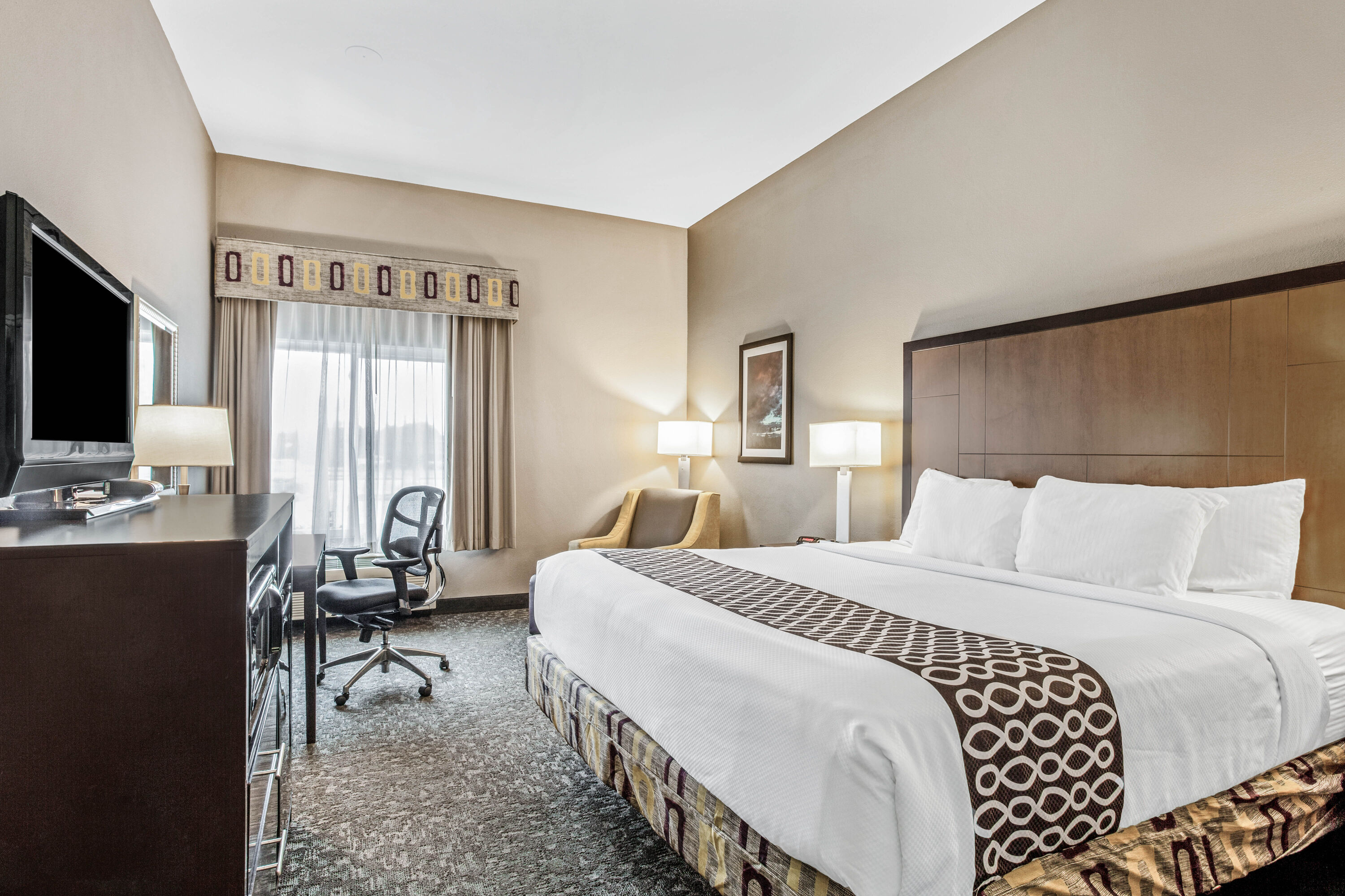 Guest room at the La Quinta Inn & Suites by Wyndham Biloxi in Biloxi, Mississippi