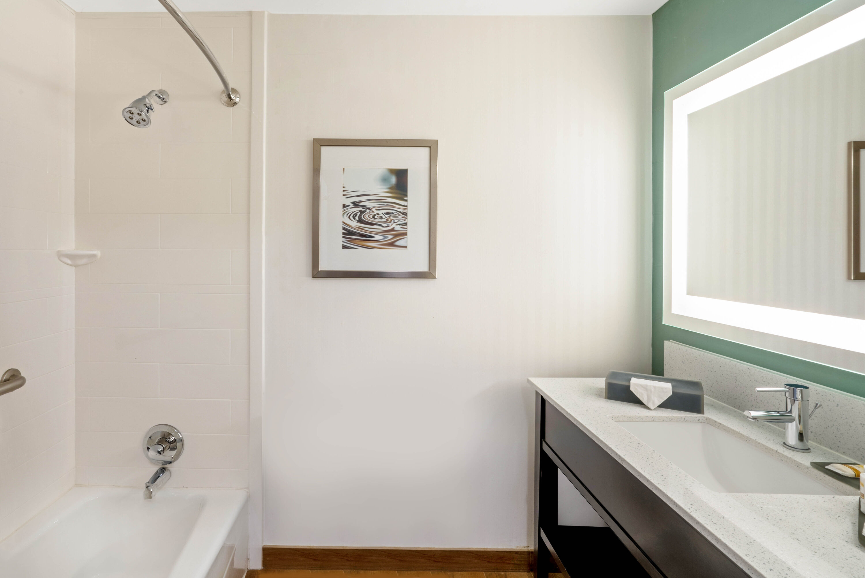 Guest room bath at the La Quinta Inn & Suites by Wyndham Columbus MS in Columbus, Mississippi